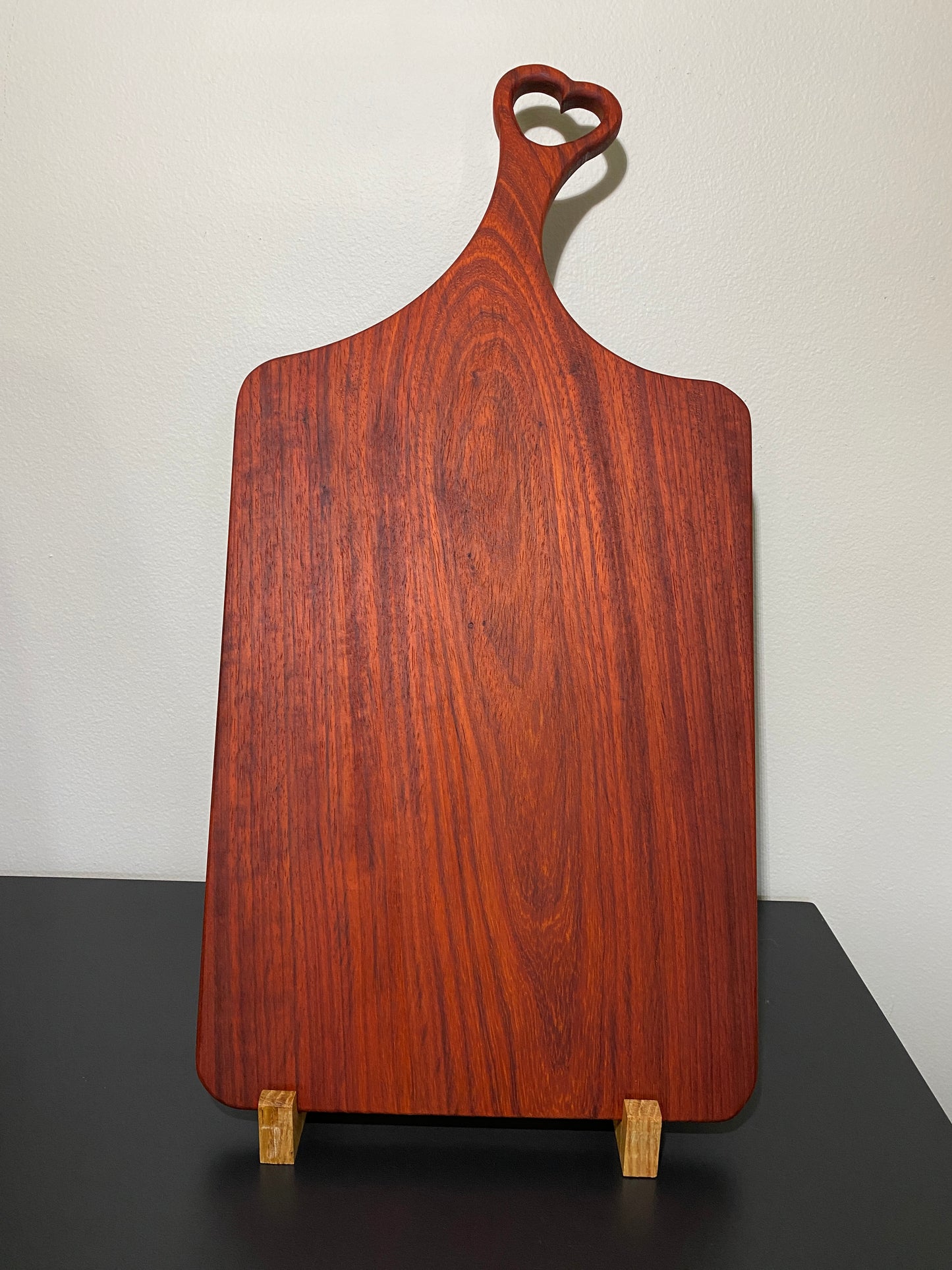 Classic padauk charcuterie board with heart handle