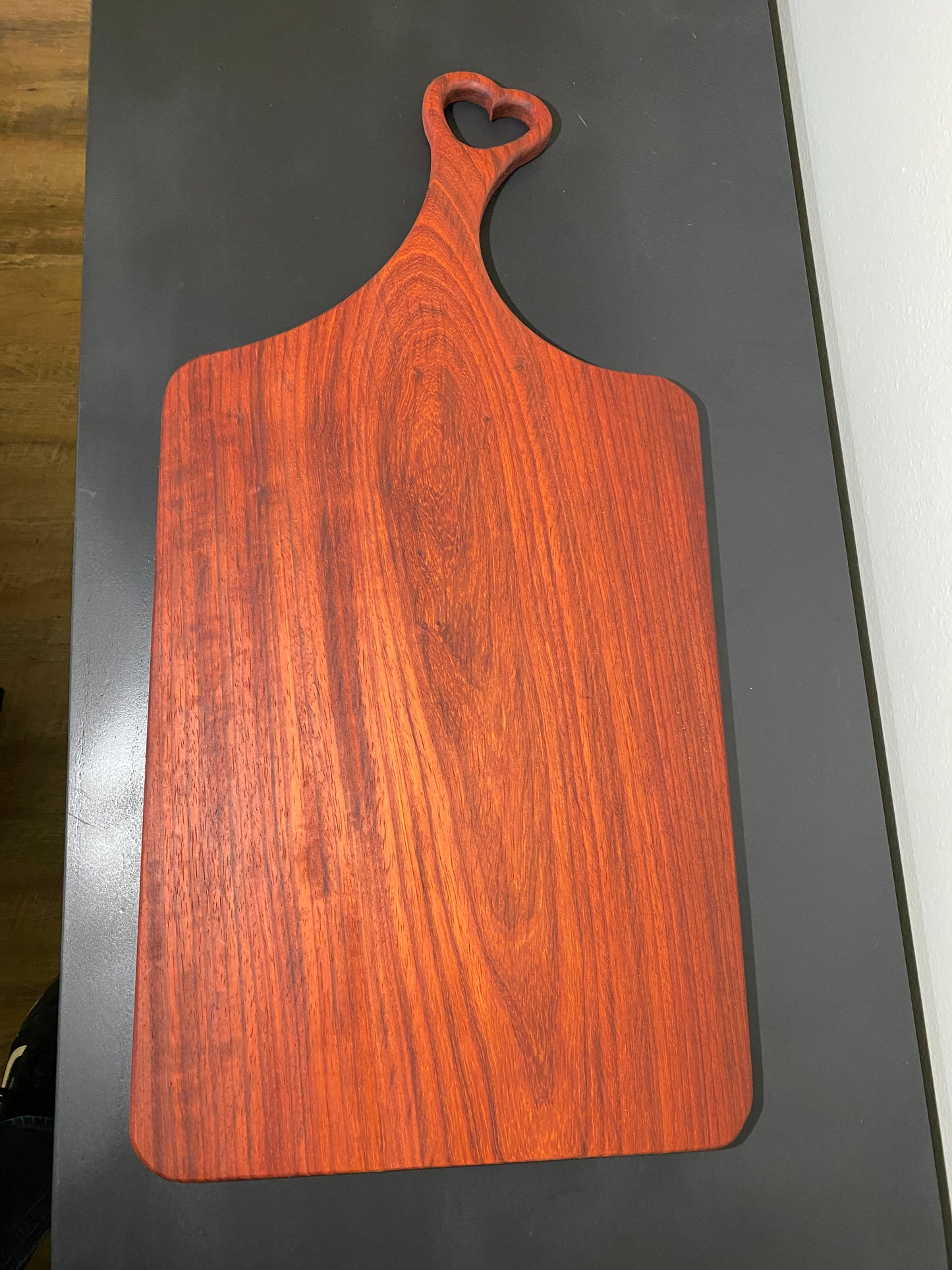 Classic padauk charcuterie board with heart handle