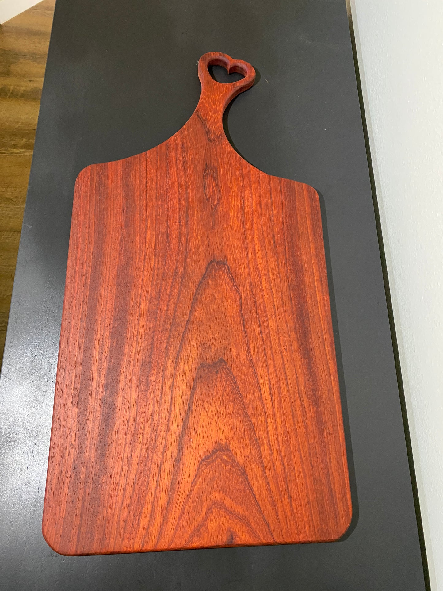 Classic padauk charcuterie board with heart handle