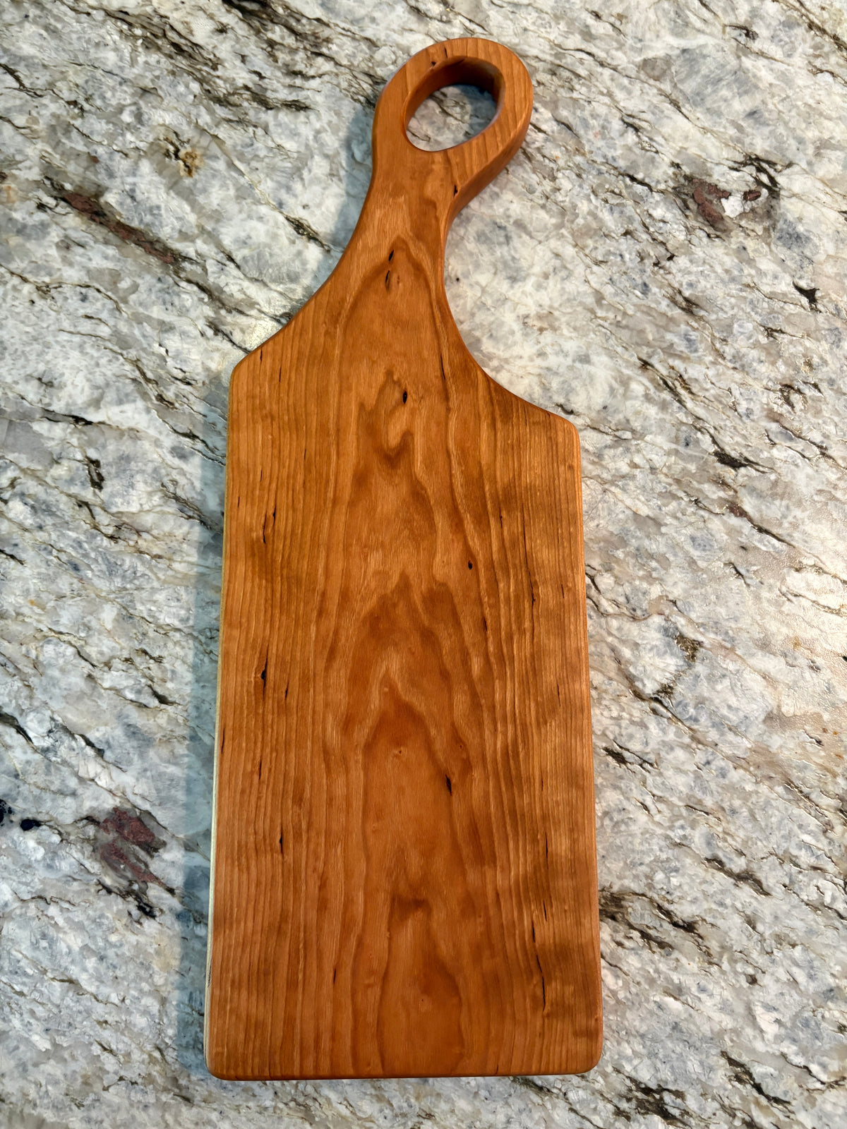 Classic Cherry charcuterie board with oval handle