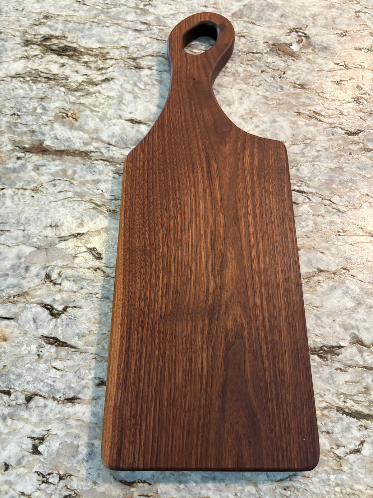 Classic Walnut charcuterie board with oval handle