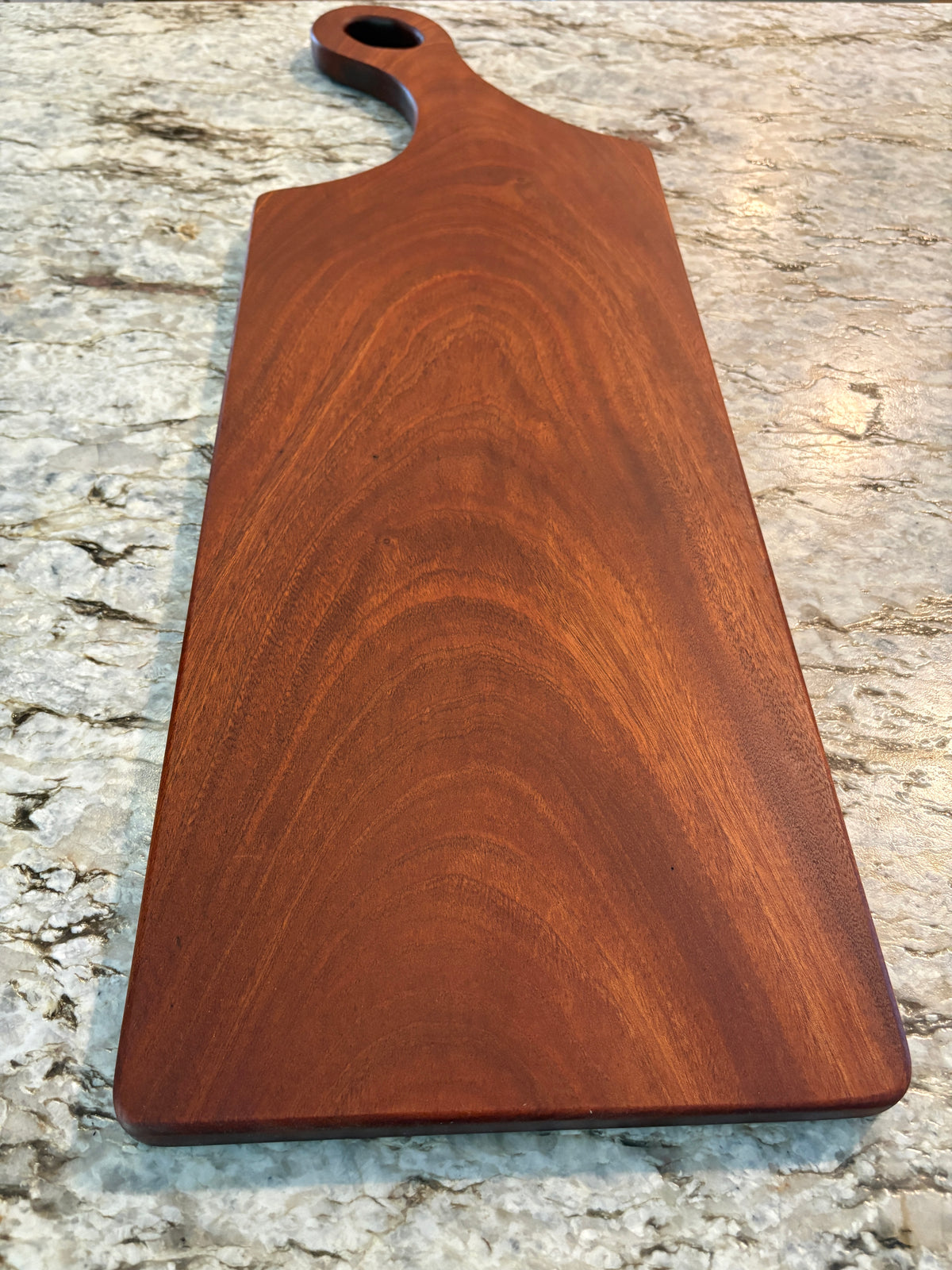 Classic Sapele charcuterie board with oval handle