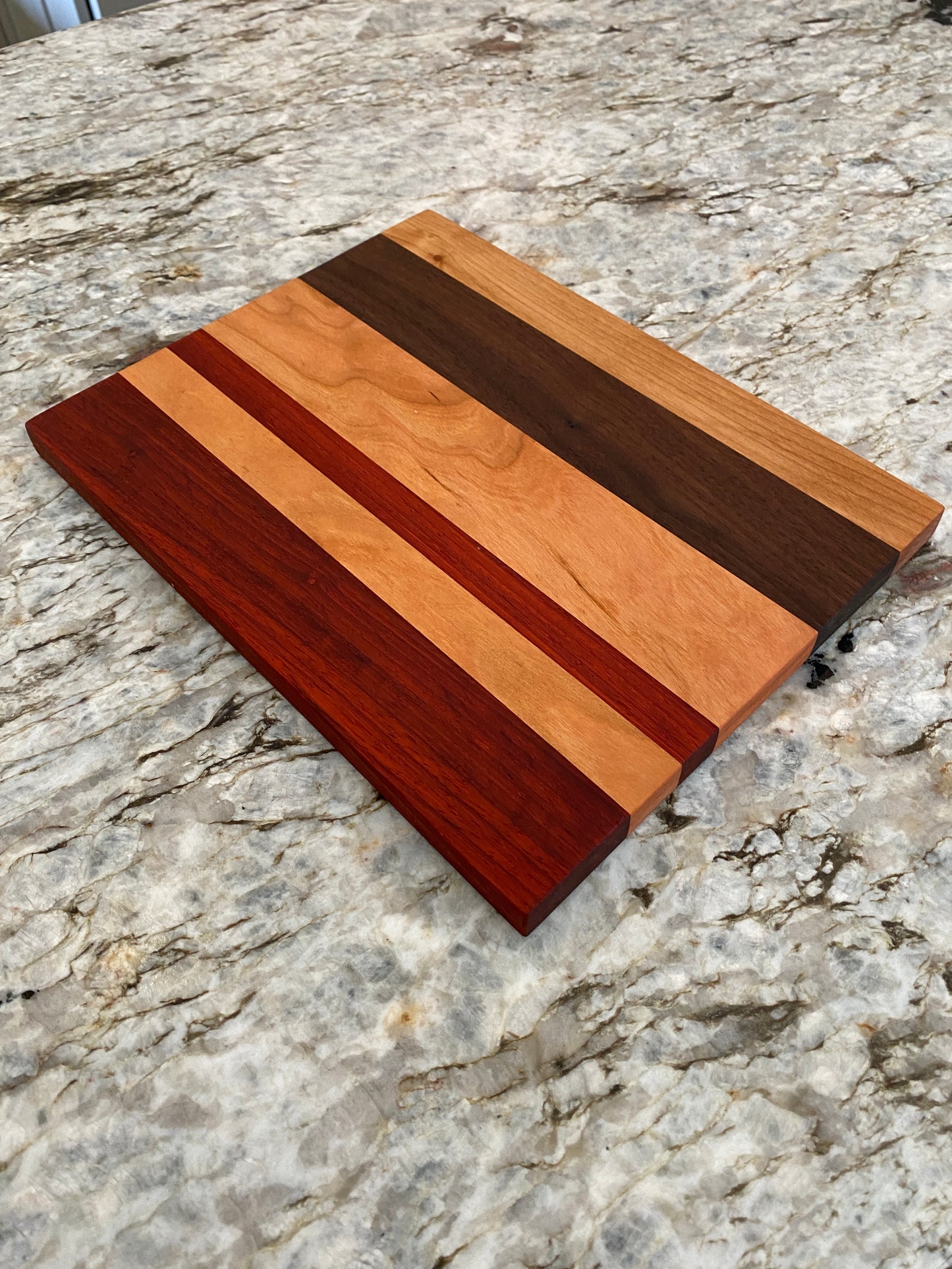Padauk, Walnut, and Cherry cutting board