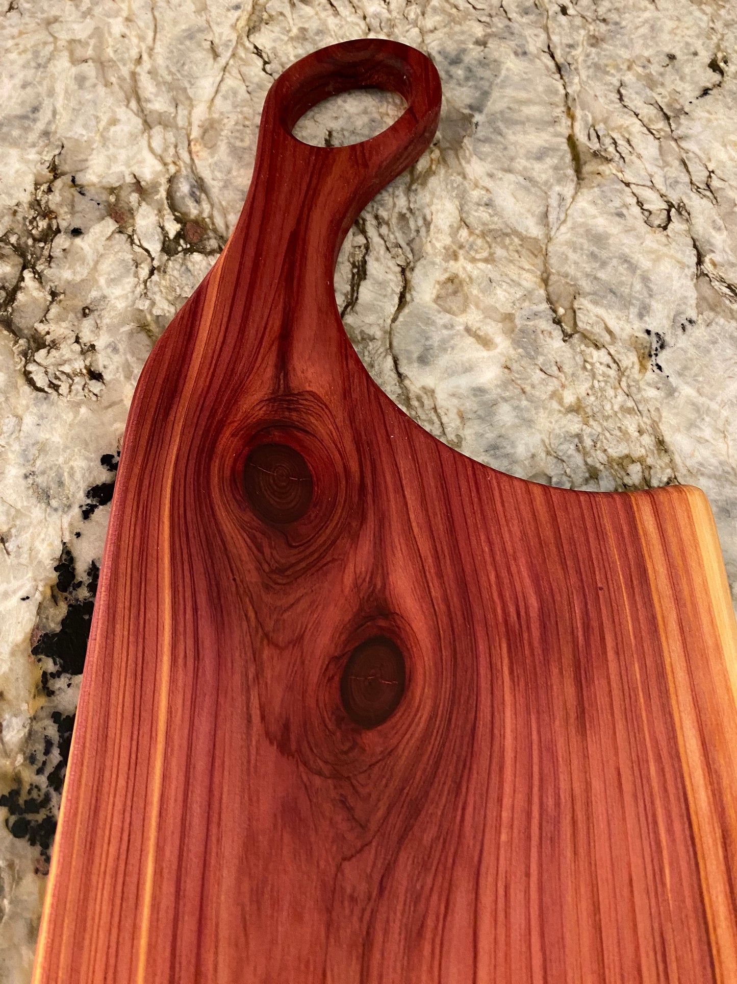 Classic aromatic cedar charcuterie board with oval handle
