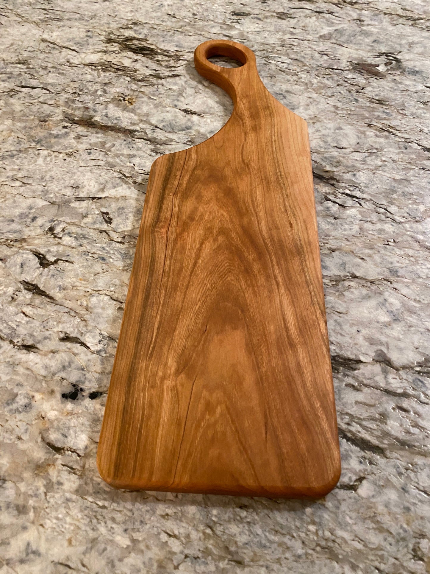 Classic Cherry charcuterie board with oval handle