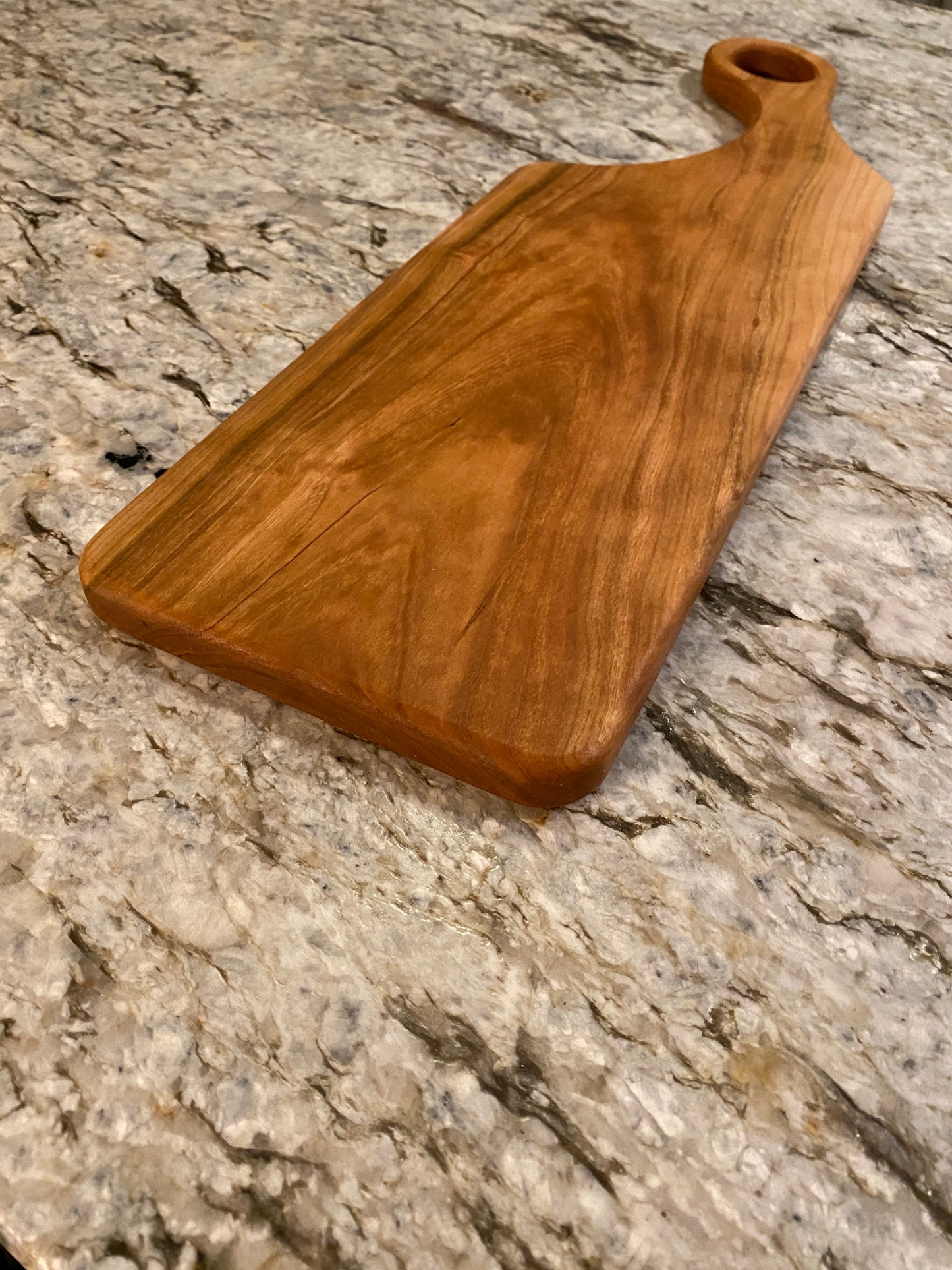 Classic Cherry charcuterie board with oval handle