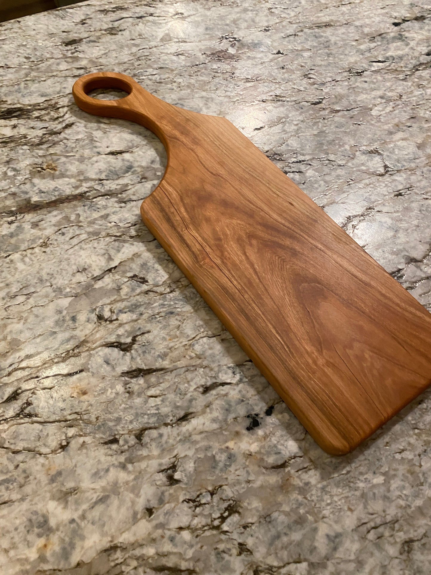 Classic Cherry charcuterie board with oval handle