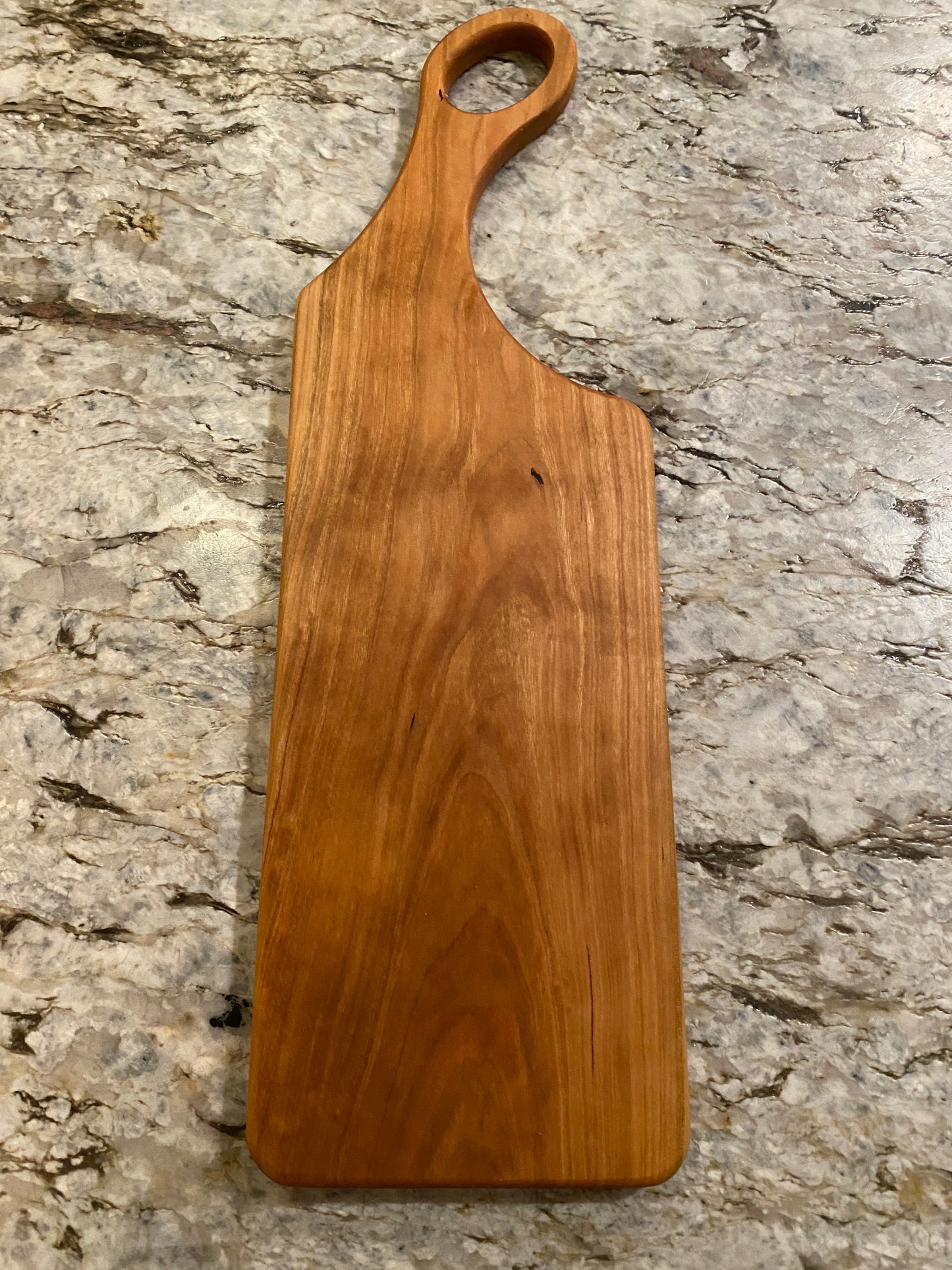 Classic Cherry charcuterie board with oval handle