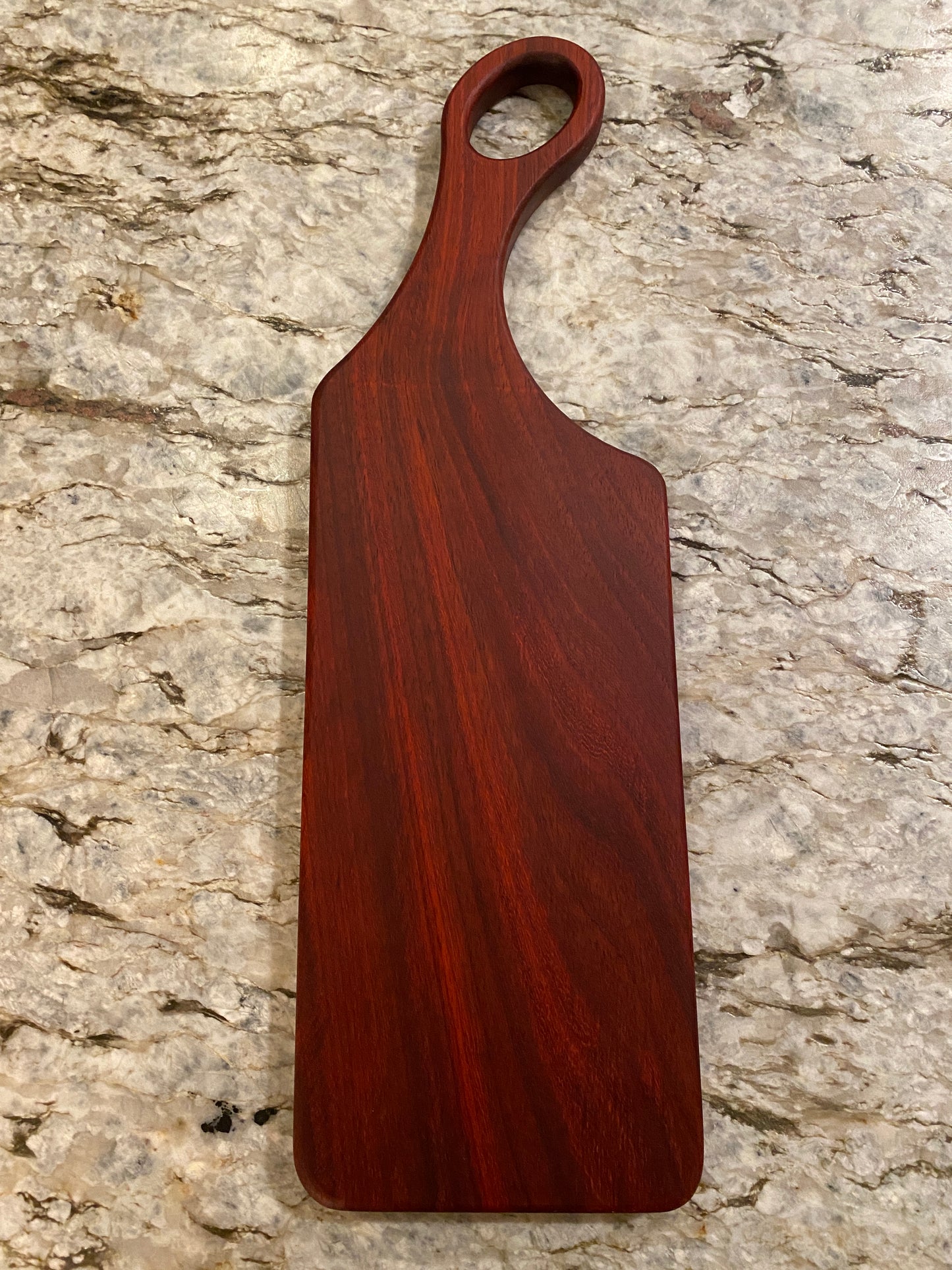 Classic Padauk charcuterie board with oval handle