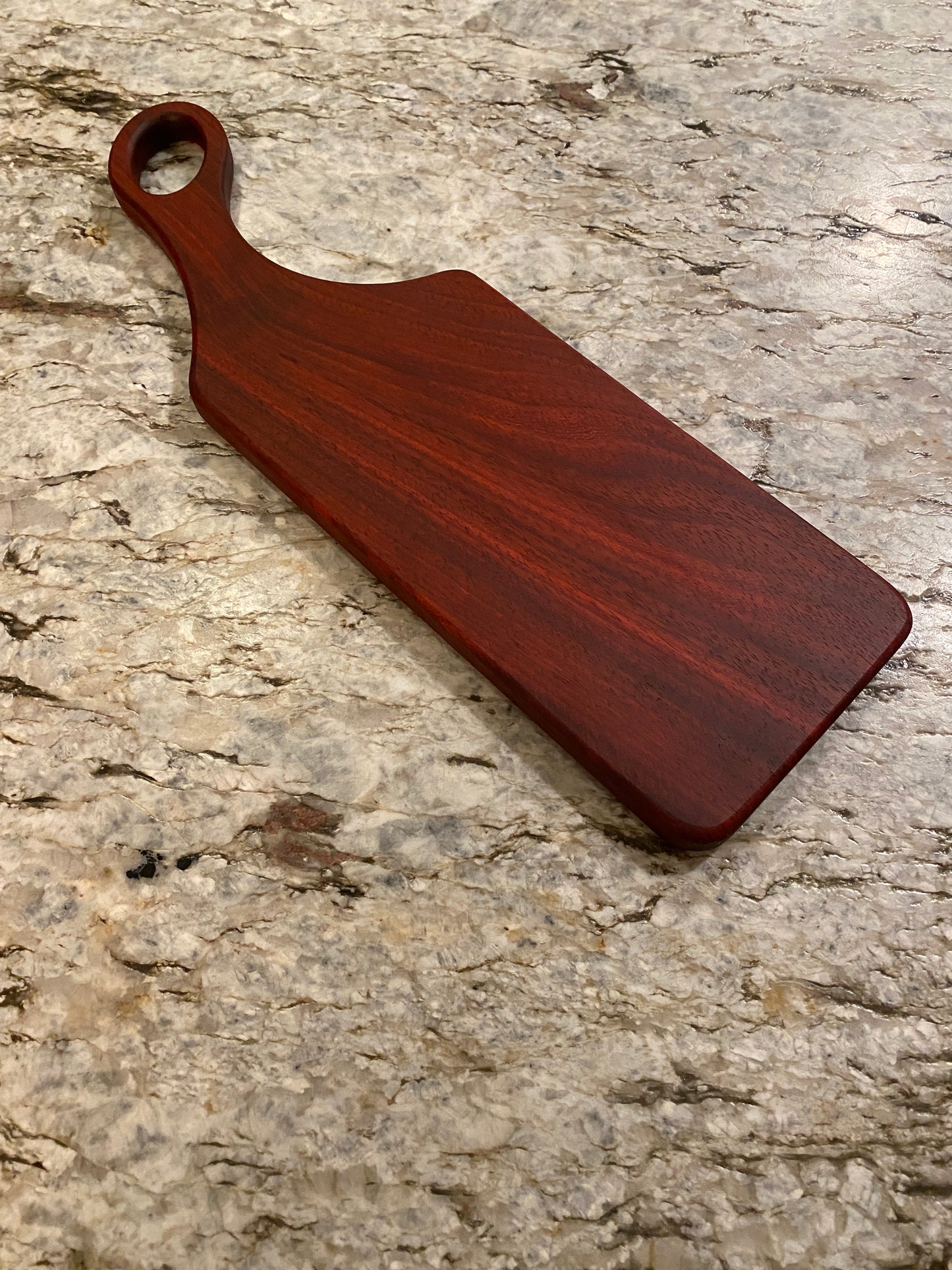 Classic Padauk charcuterie board with oval handle