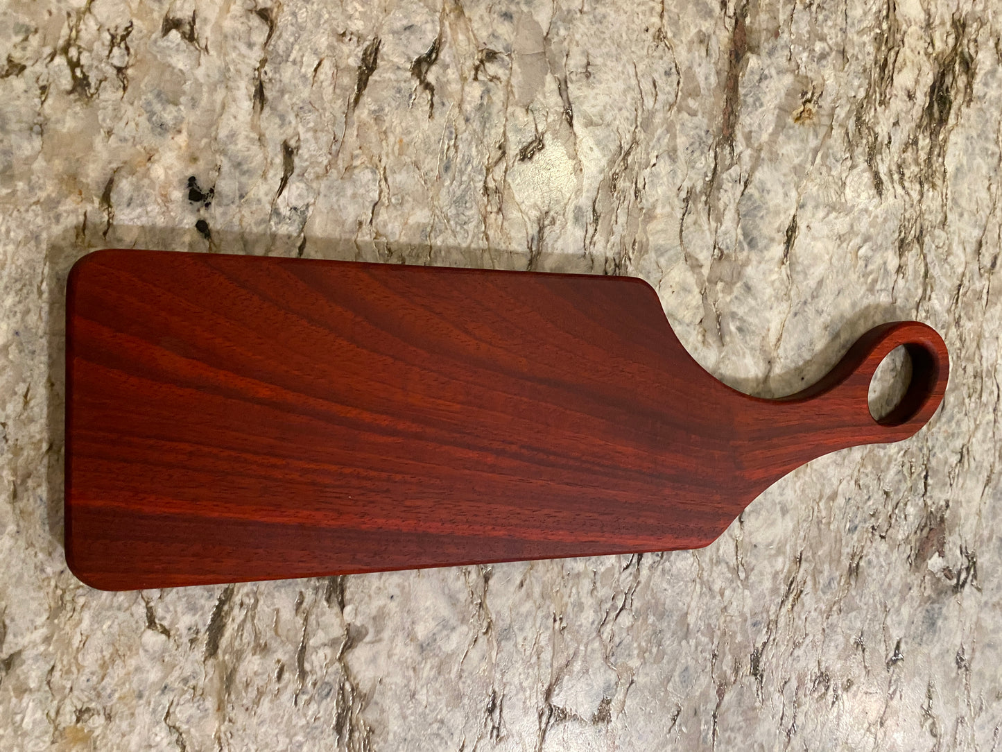 Classic Padauk charcuterie board with oval handle