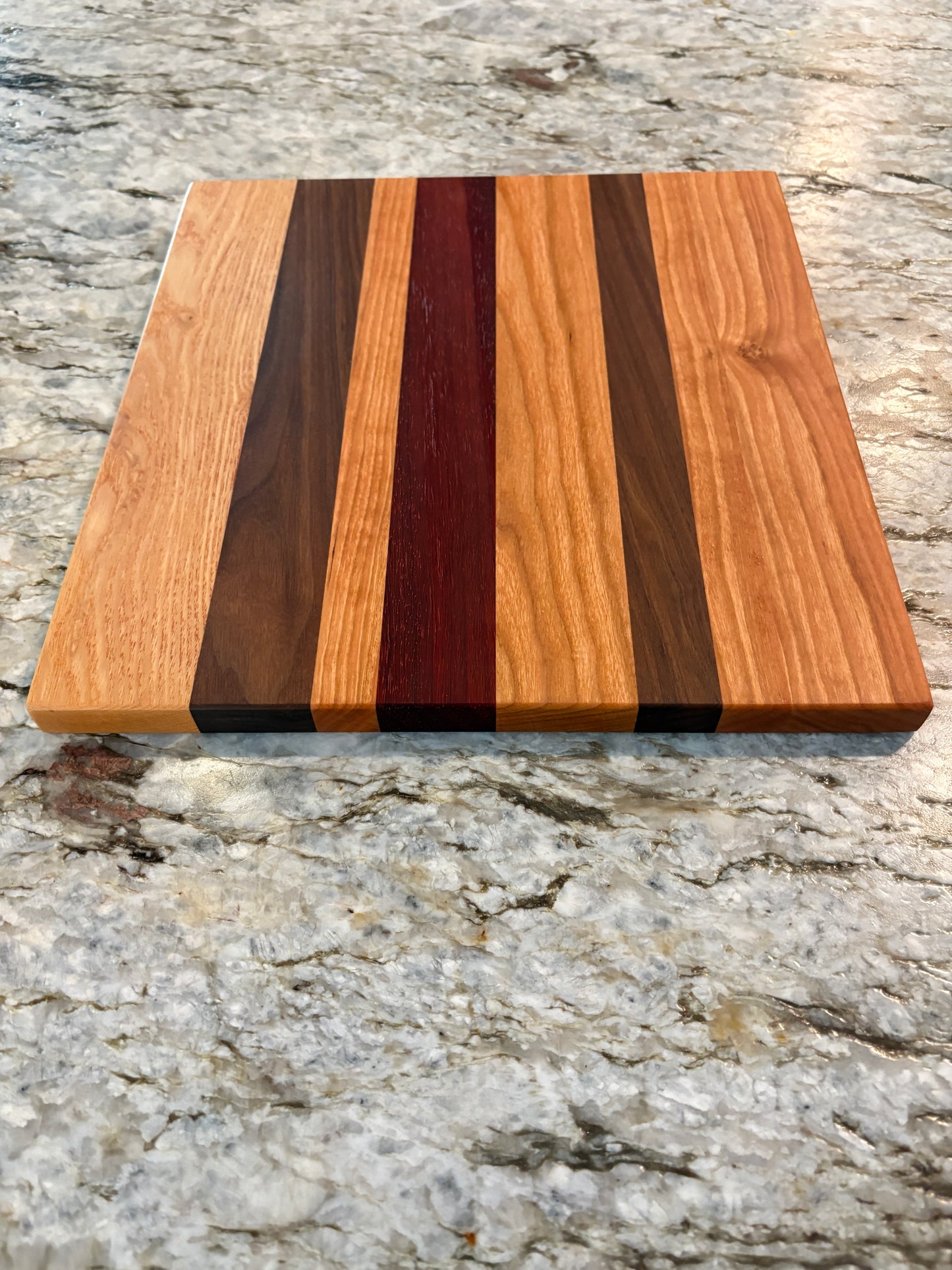 Cherry, Padauk, Walnut, and Ash Cutting Board