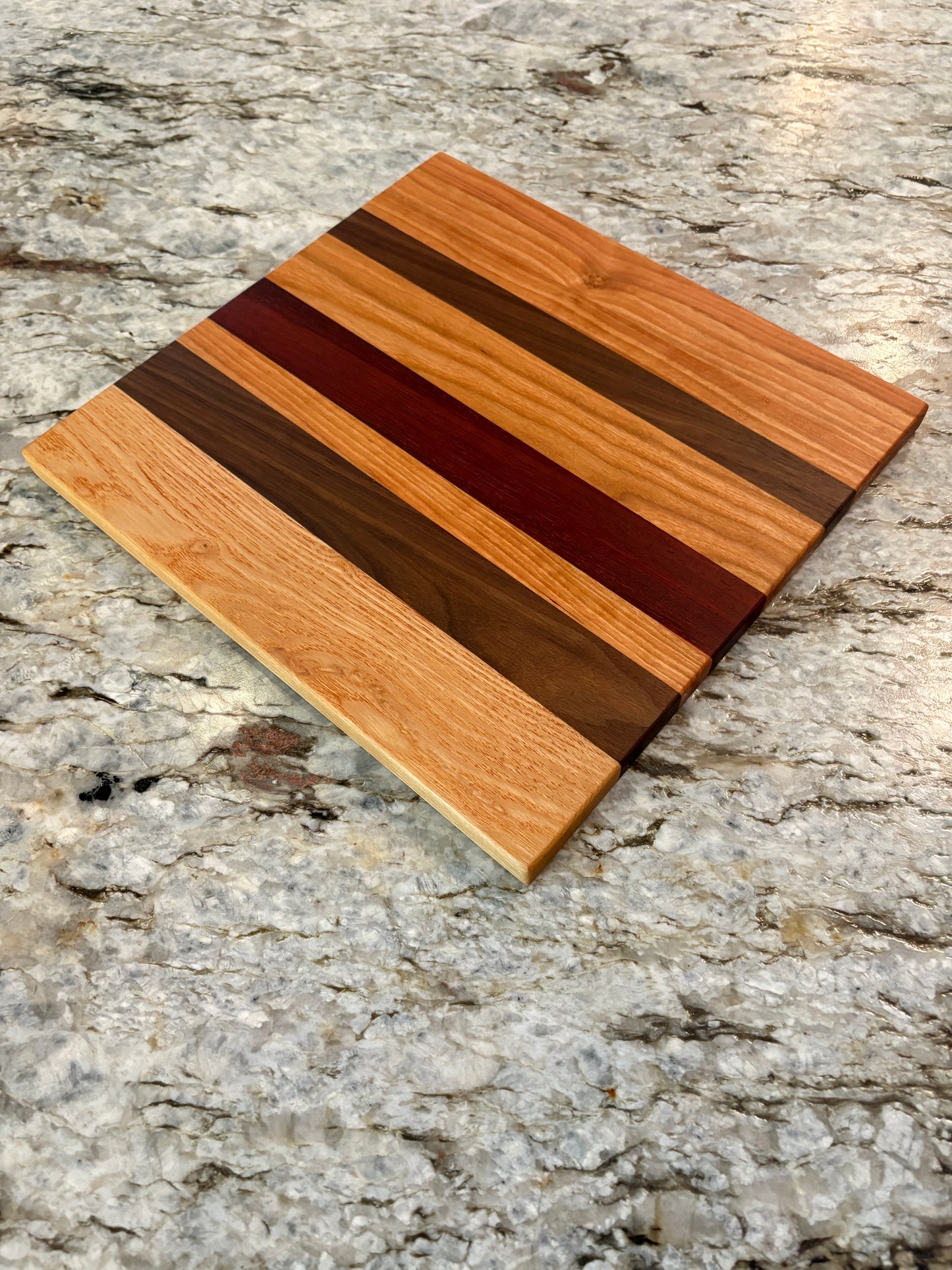 Cherry, Padauk, Walnut, and Ash Cutting Board