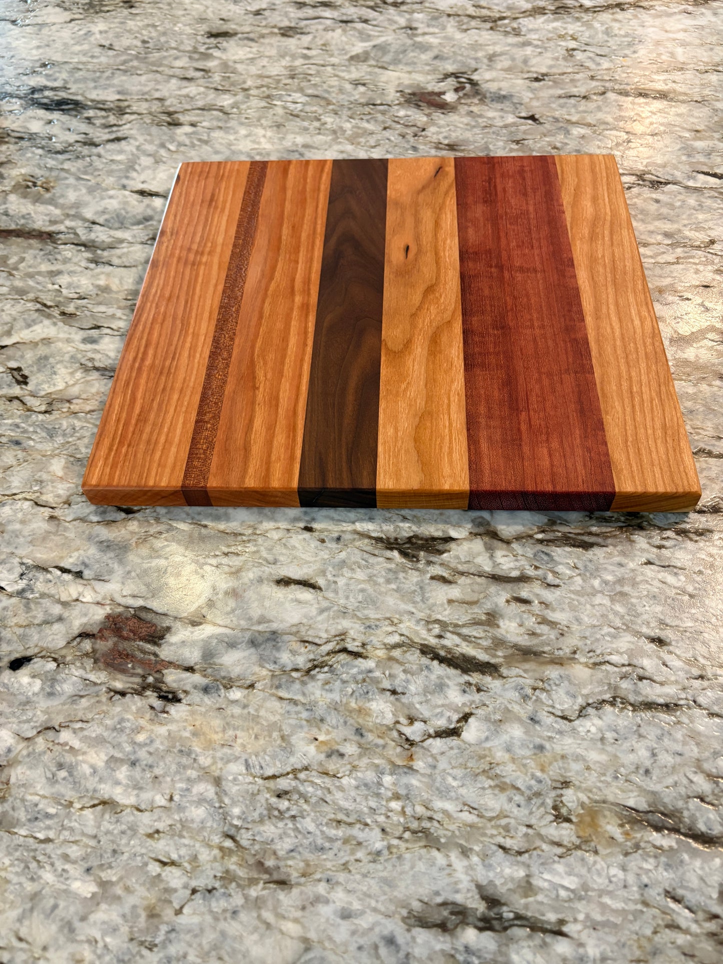 Cherry, Purple Heart, Walnut, and Sapele Cutting Board