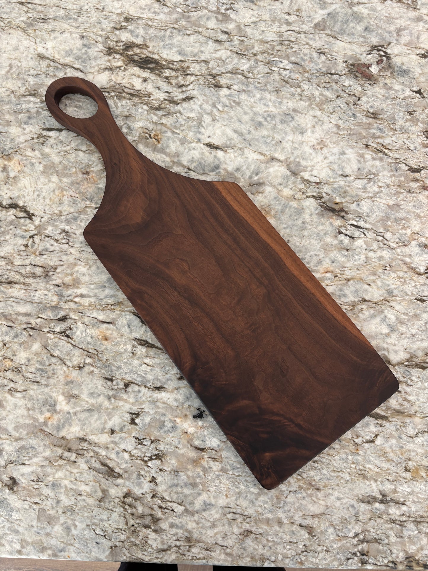 Classic figured walnut charcuterie board with handle