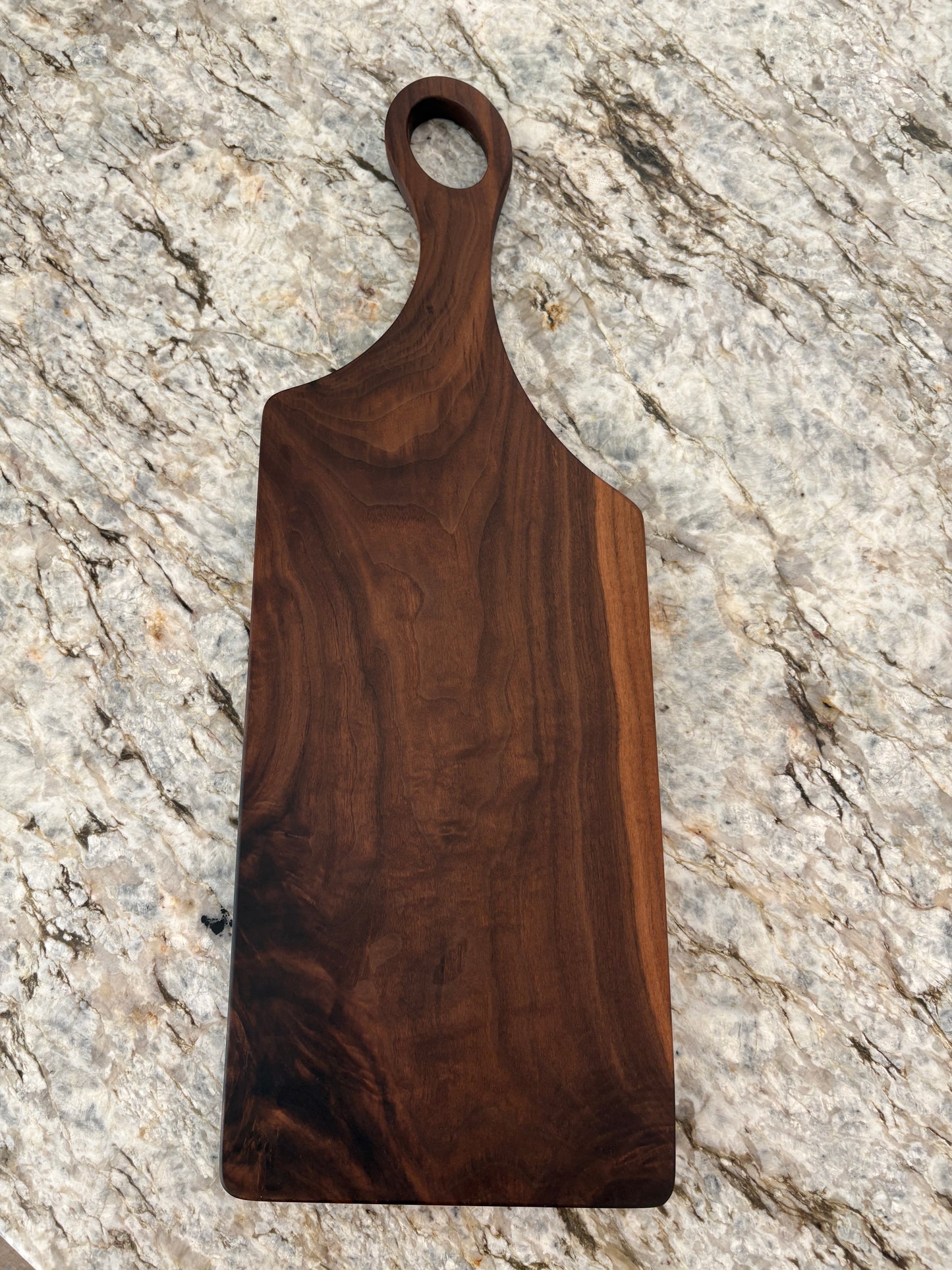 Classic figured walnut charcuterie board with handle