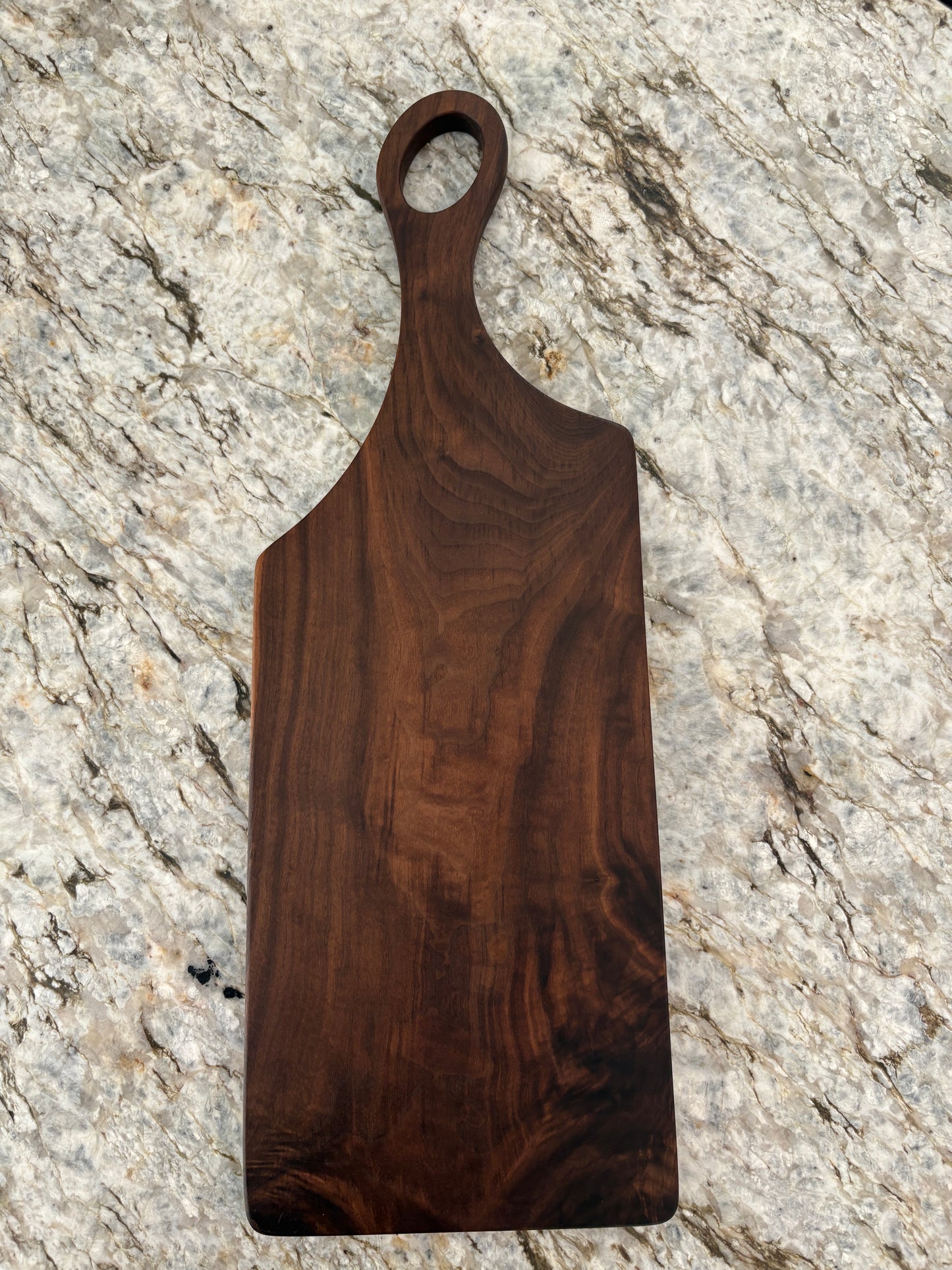 Classic figured walnut charcuterie board with handle