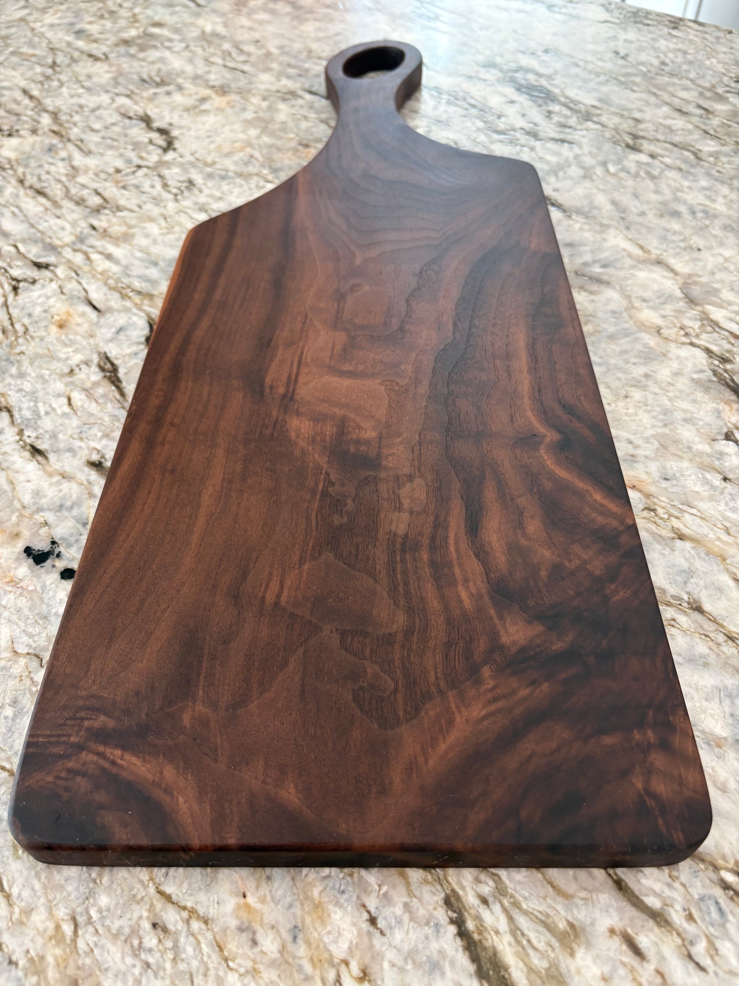 Classic figured walnut charcuterie board with handle