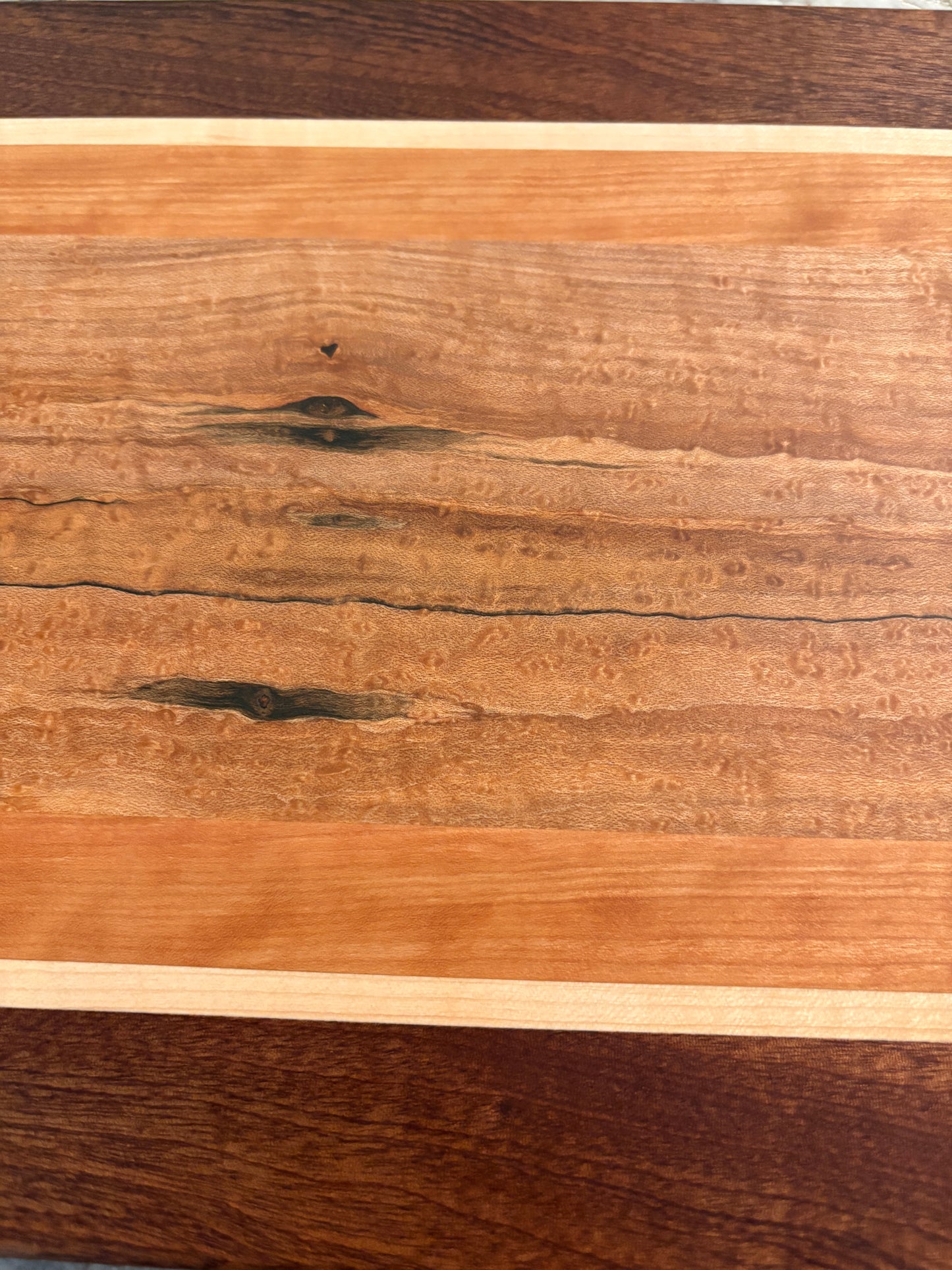 Birdseye/spalted maple, cherry, maple and sapele Serving/Charcuterie Board with handles