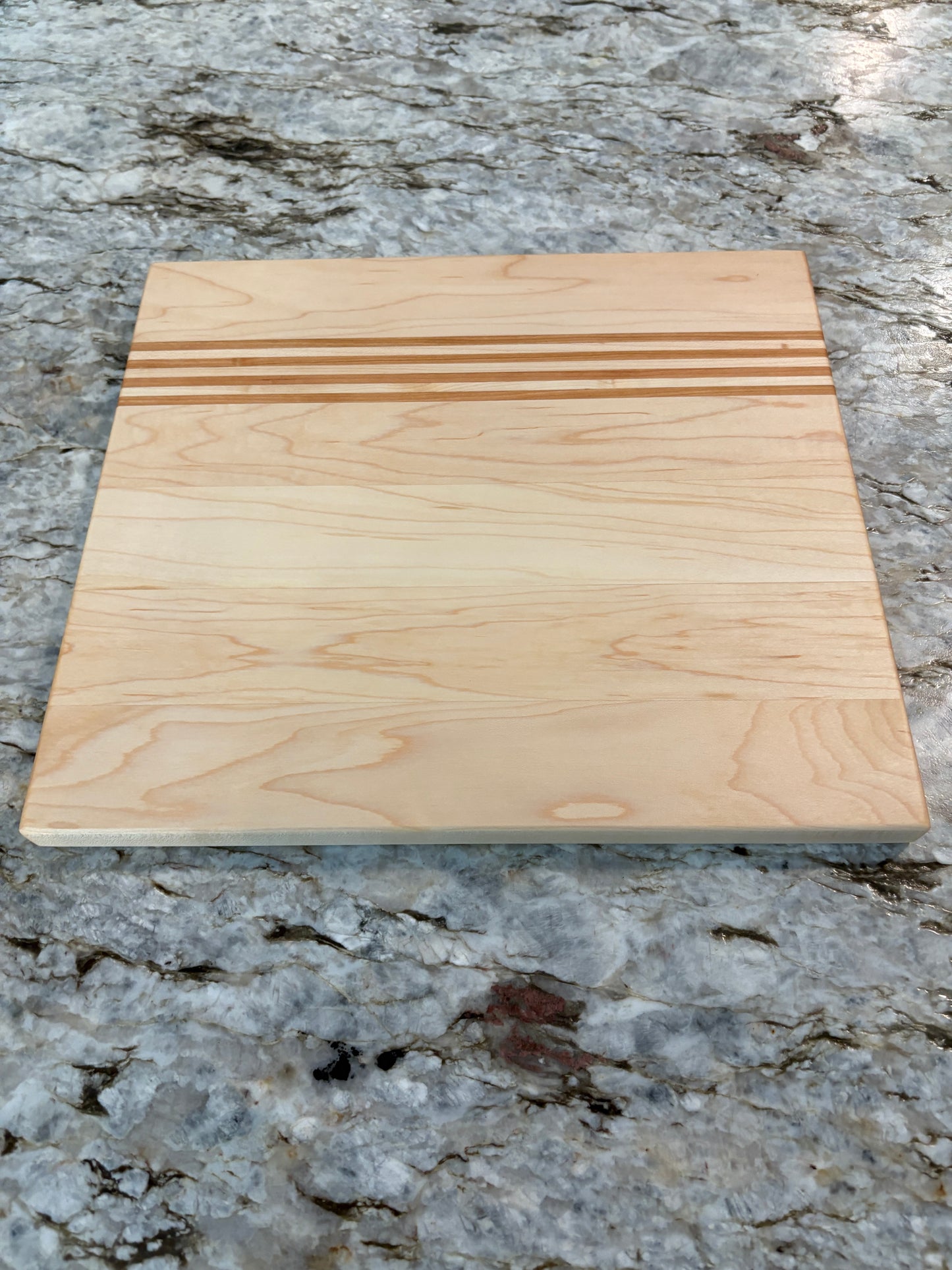 Maple cutting board with Cherry/Maple accent strips