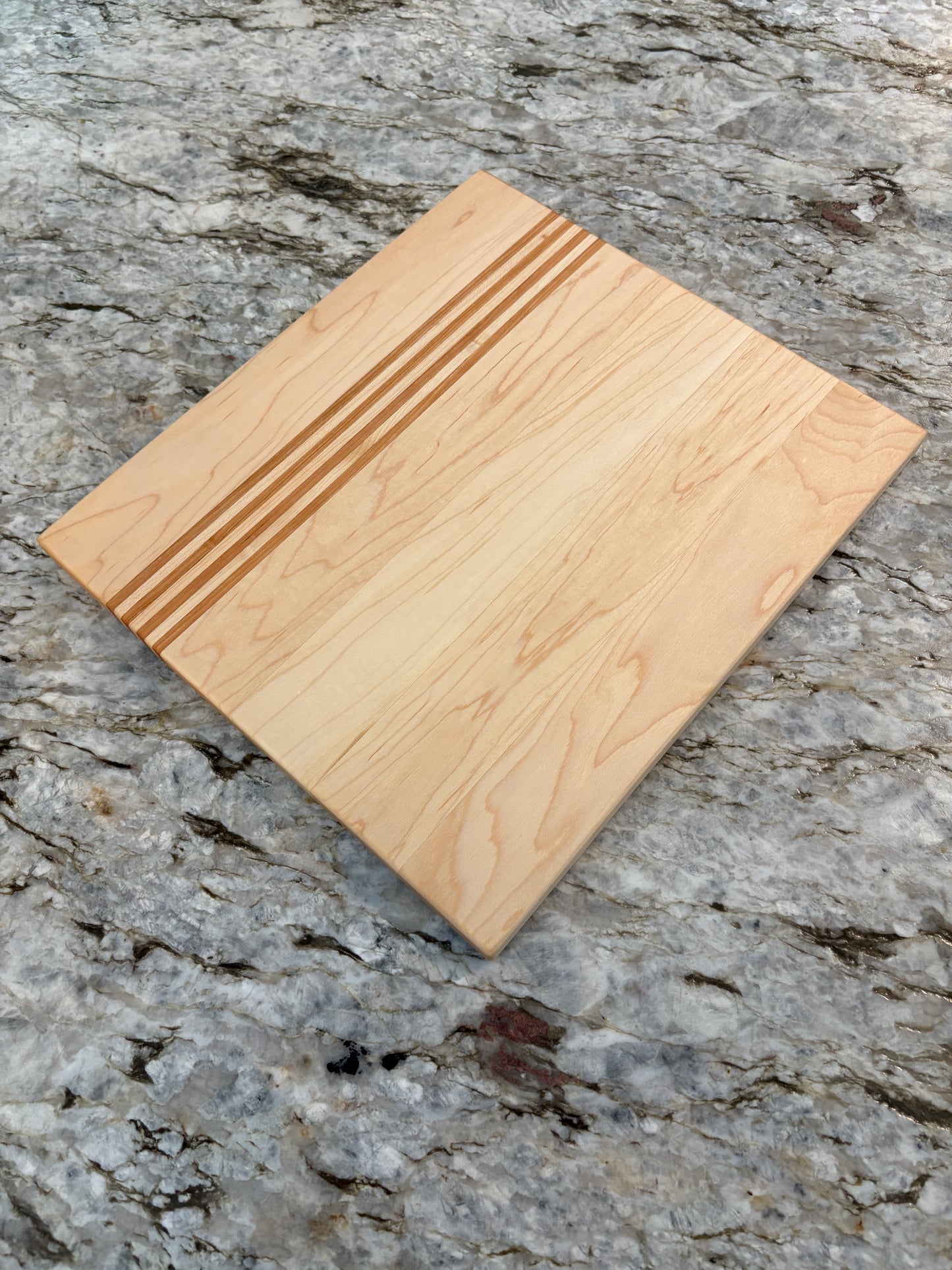 Maple cutting board with Cherry/Maple accent strips