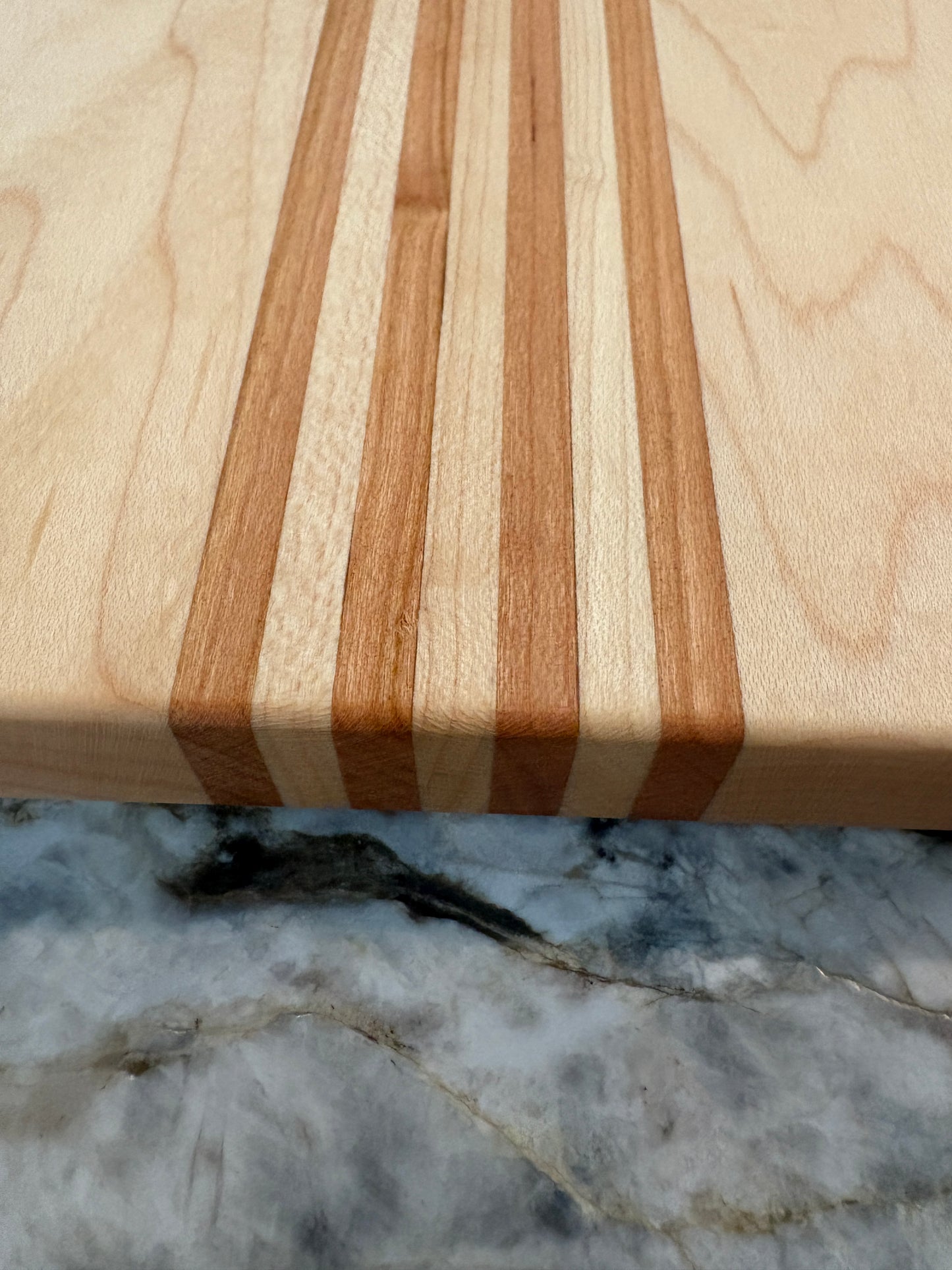 Maple cutting board with Cherry/Maple accent strips