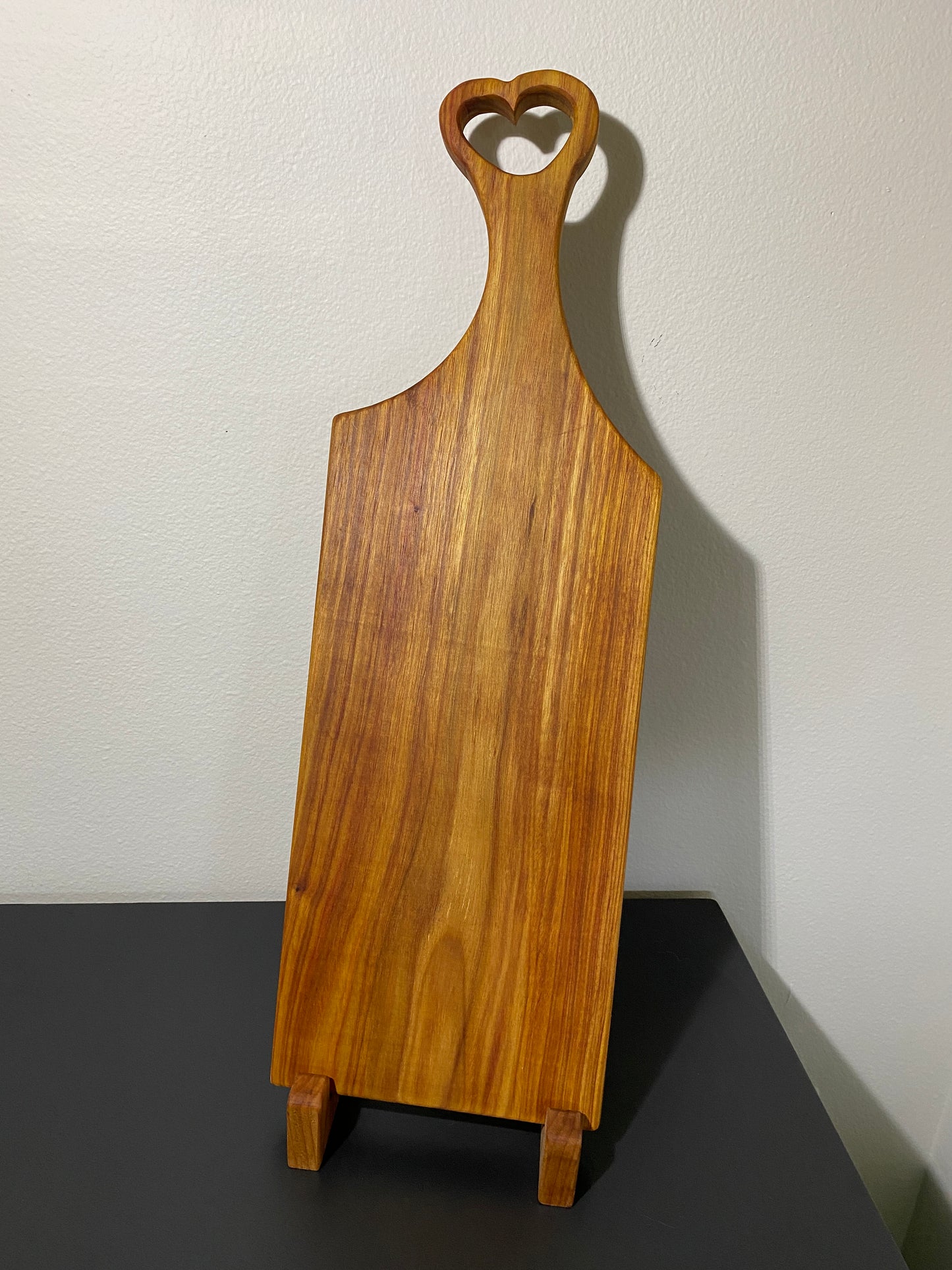 Classic canary wood charcuterie board with heart handle