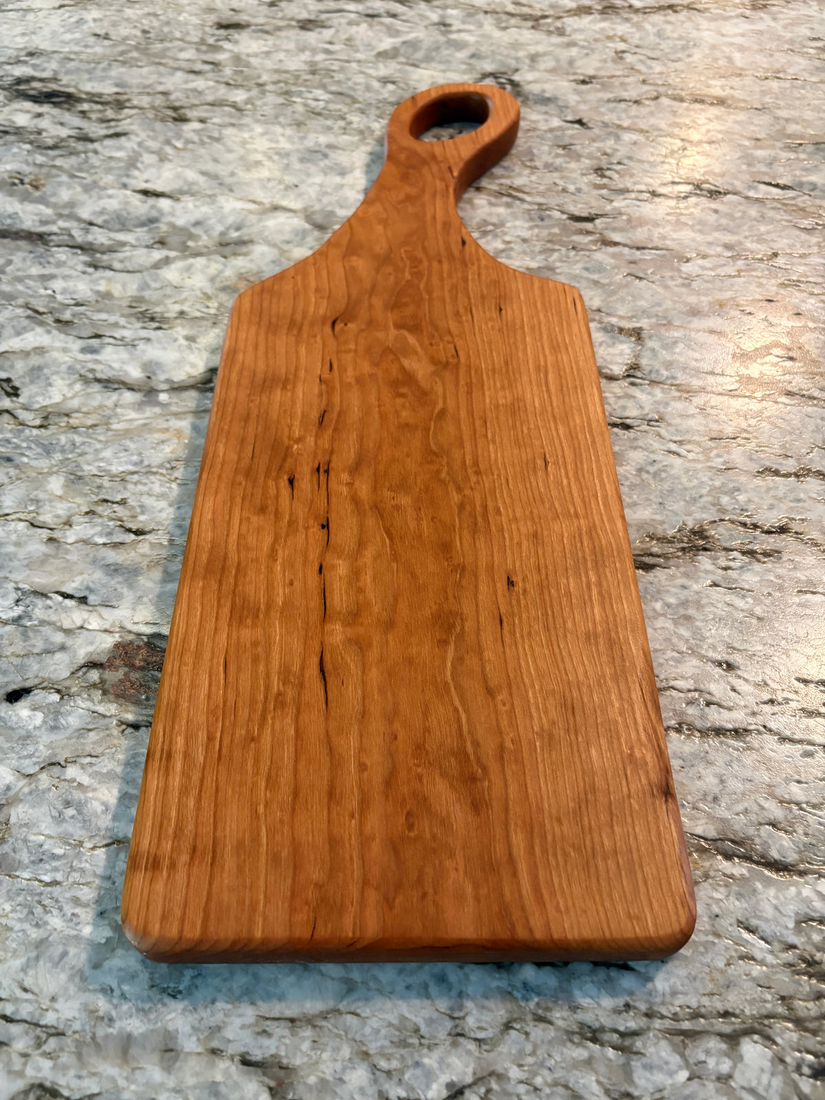 Classic Cherry charcuterie board with oval handle