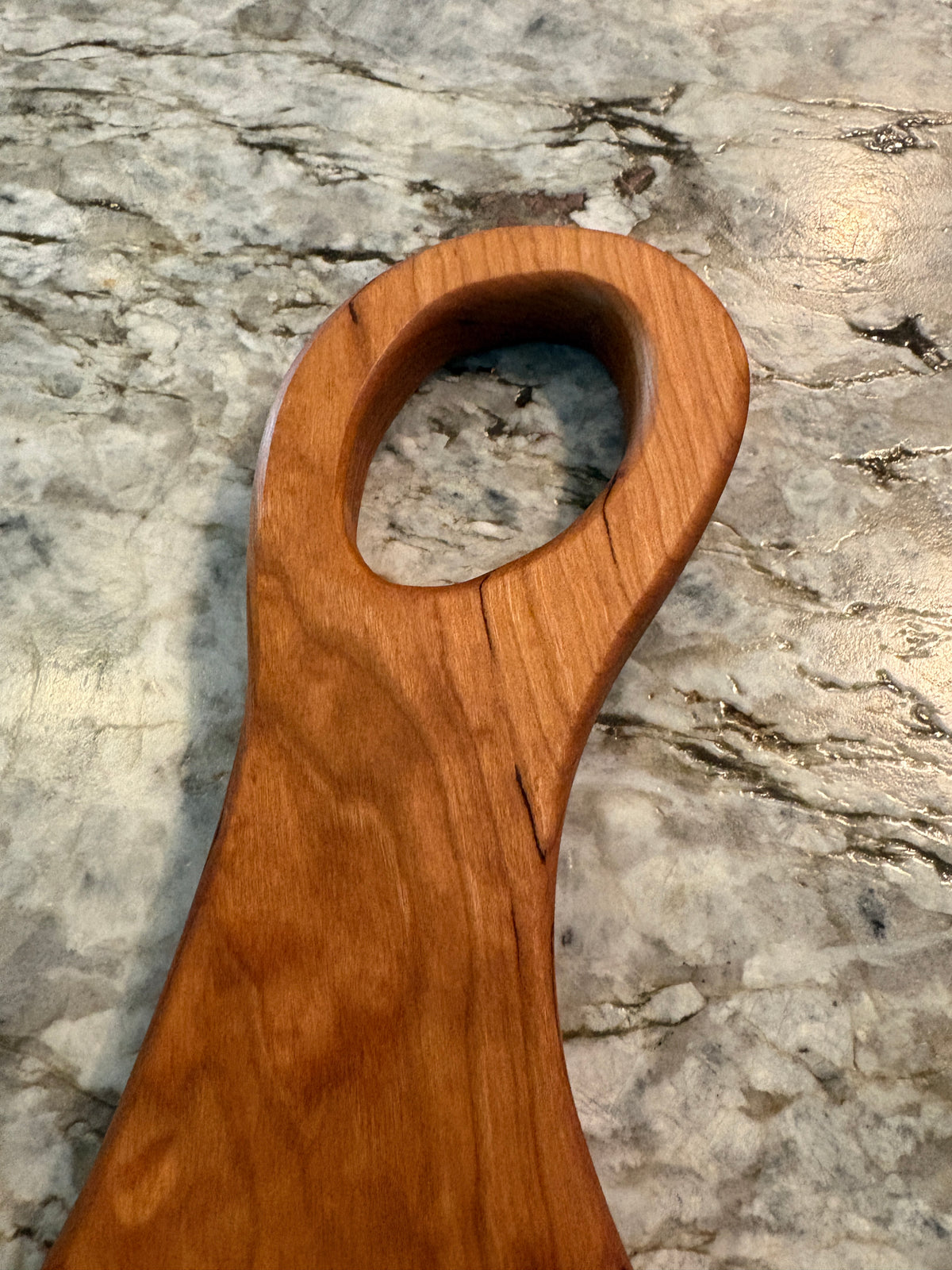 Classic Cherry charcuterie board with oval handle