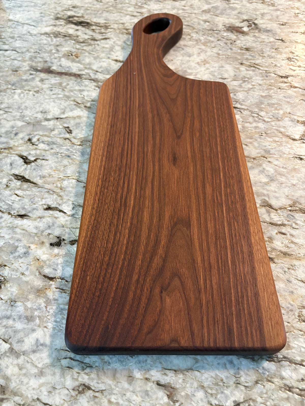 Classic Walnut charcuterie board with oval handle