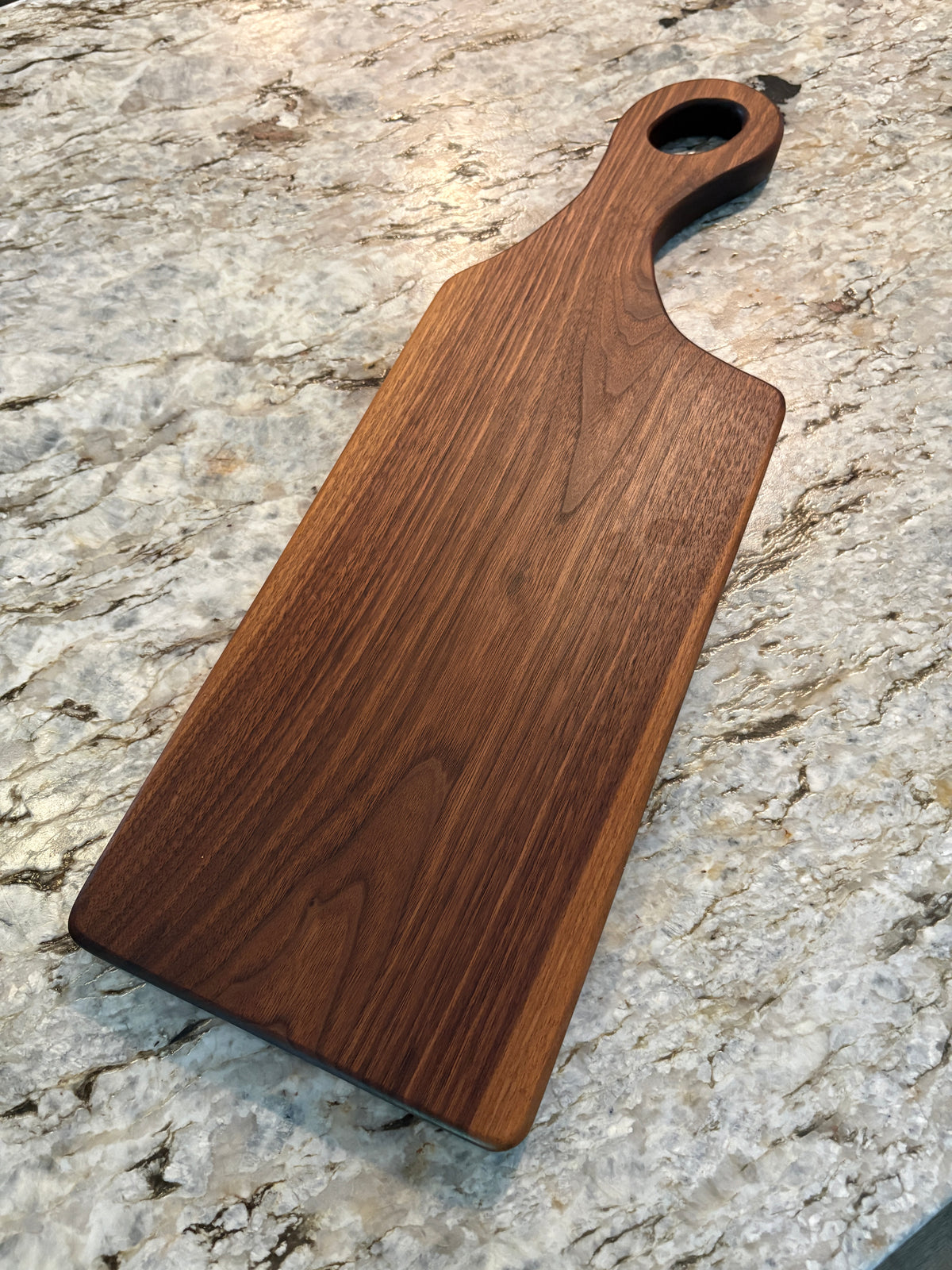 Classic Walnut charcuterie board with oval handle