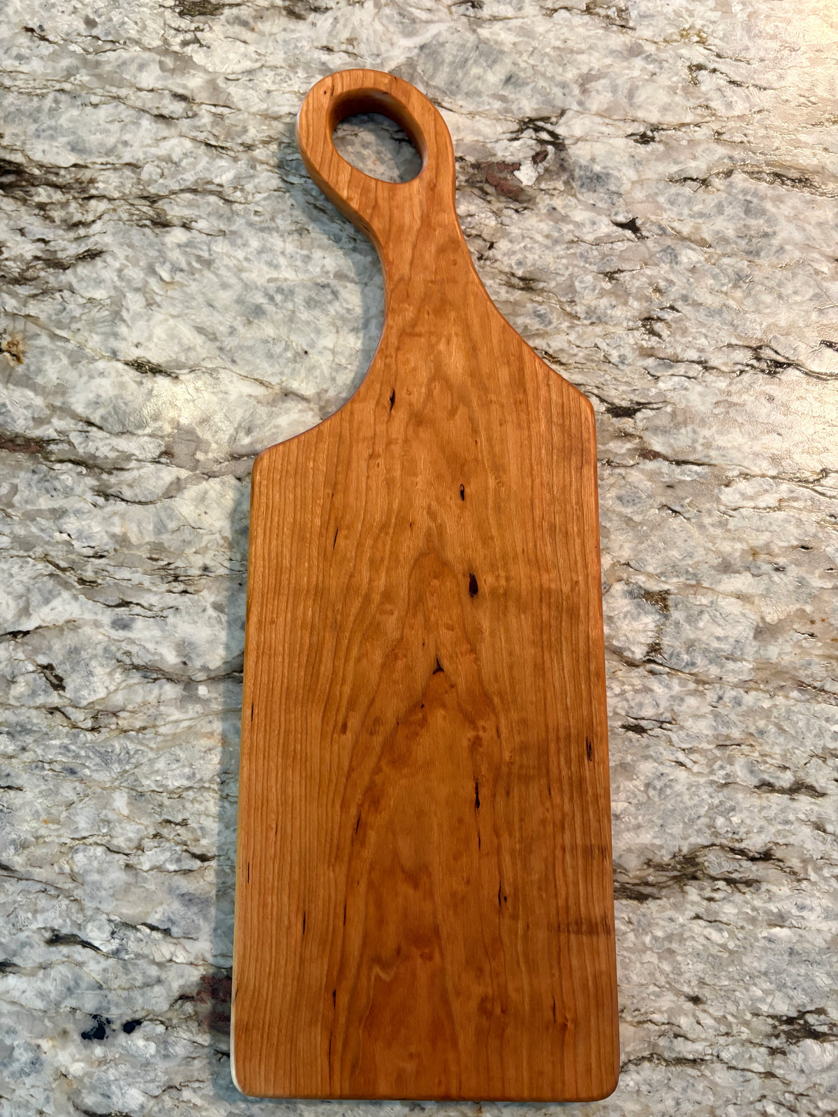 Classic Cherry charcuterie board with oval handle