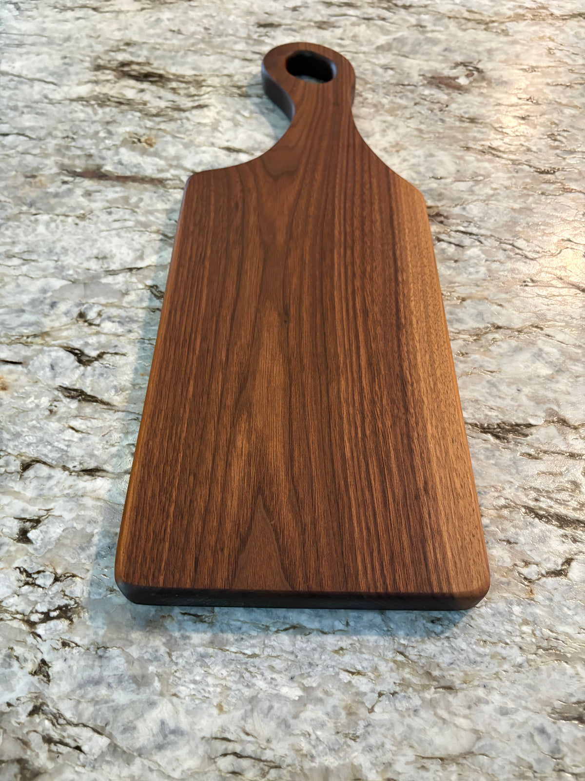 Classic Walnut charcuterie board with oval handle