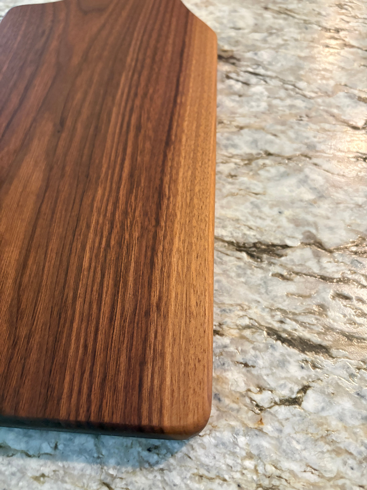 Classic Walnut charcuterie board with oval handle
