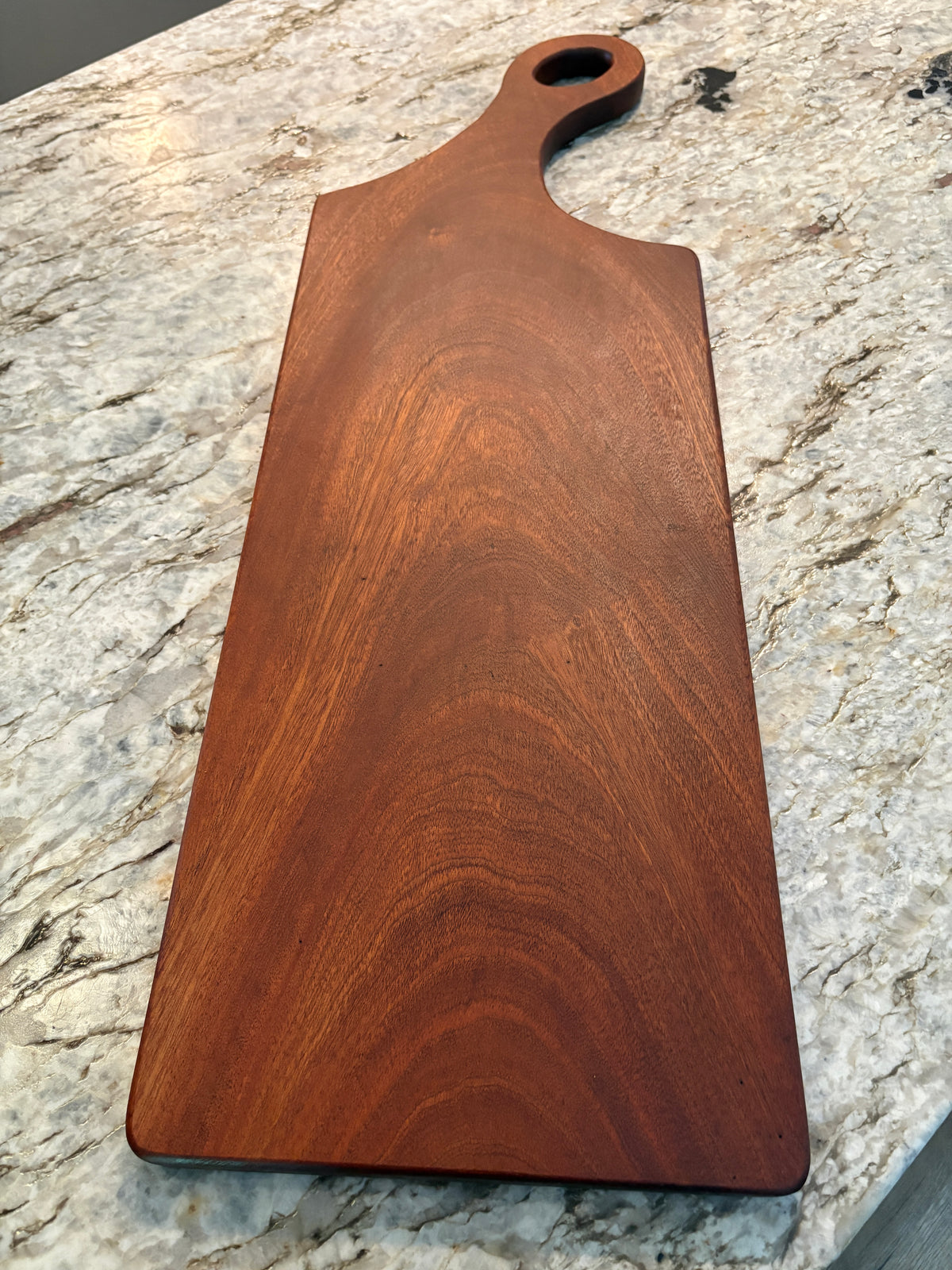 Classic Sapele charcuterie board with oval handle