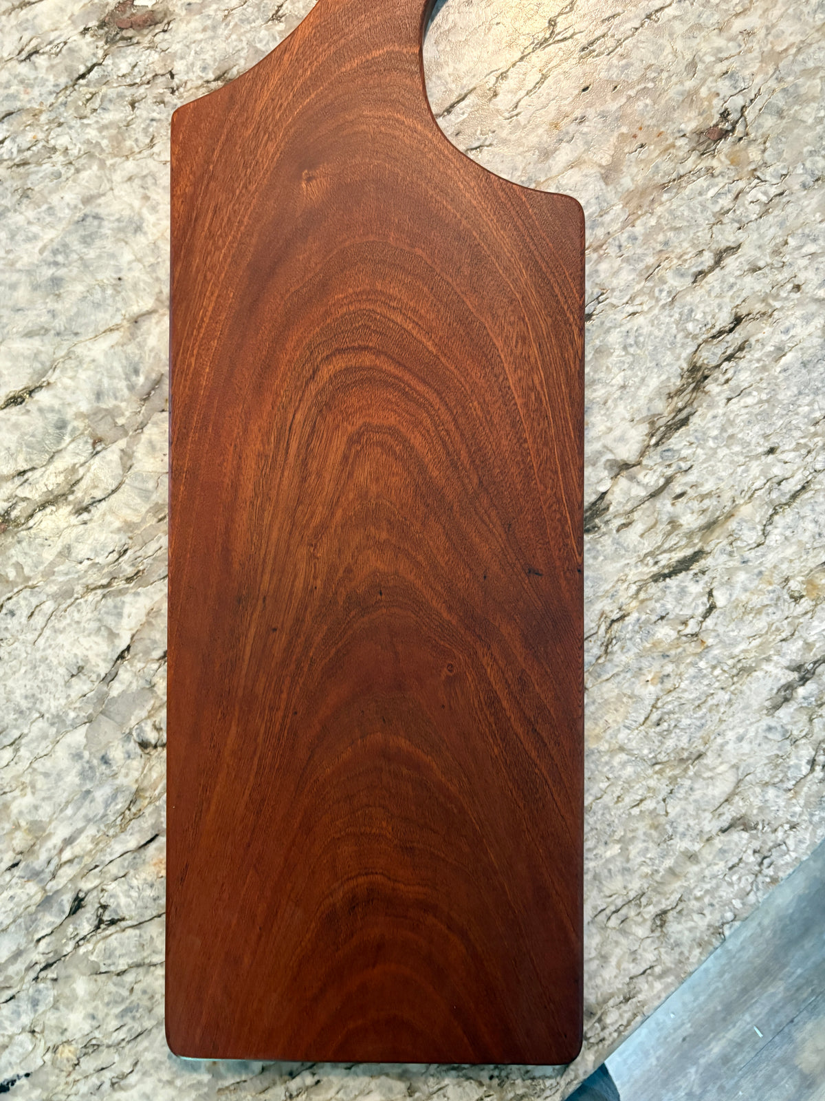 Classic Sapele charcuterie board with oval handle