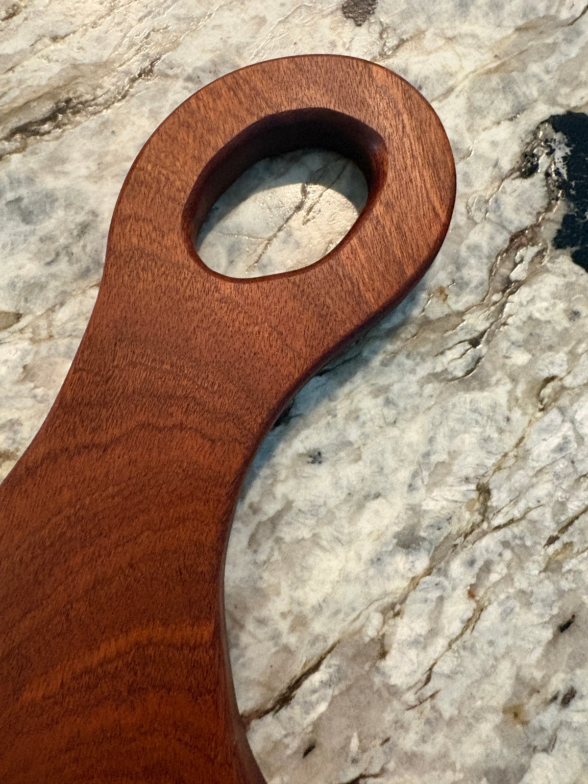 Classic Sapele charcuterie board with oval handle