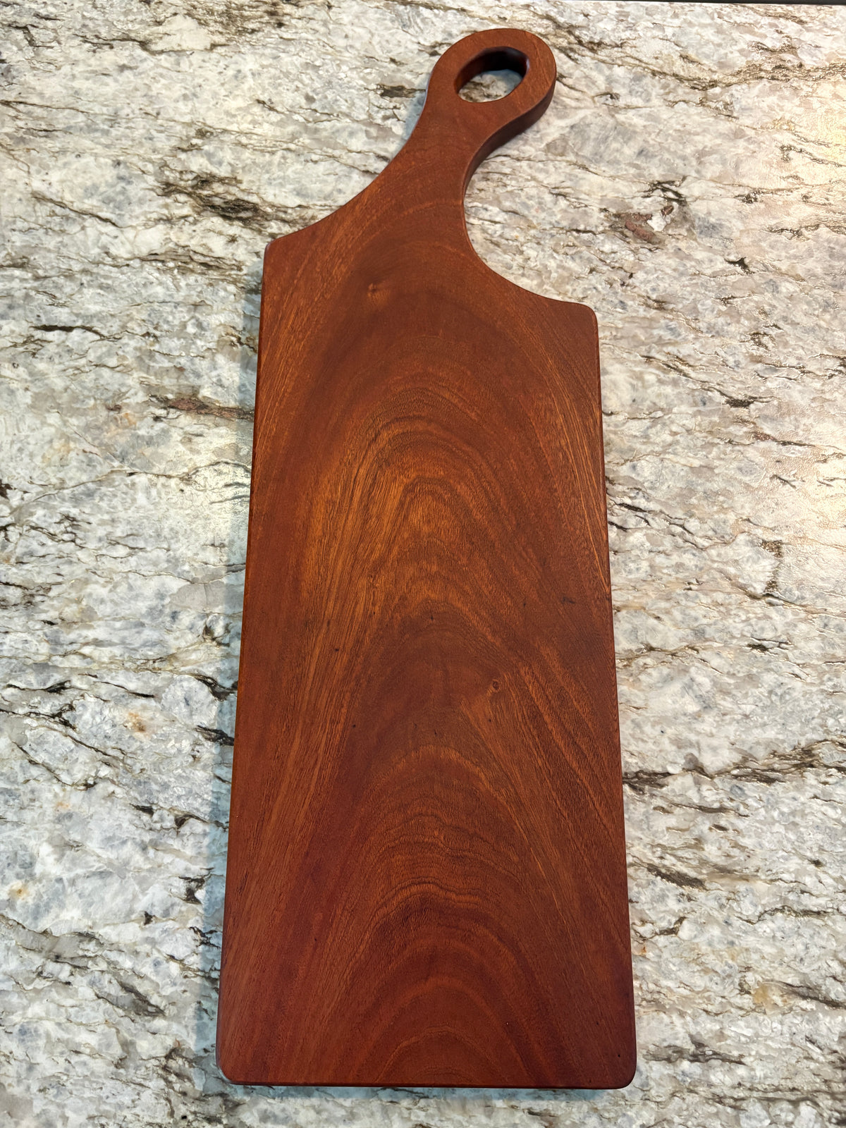 Classic Sapele charcuterie board with oval handle