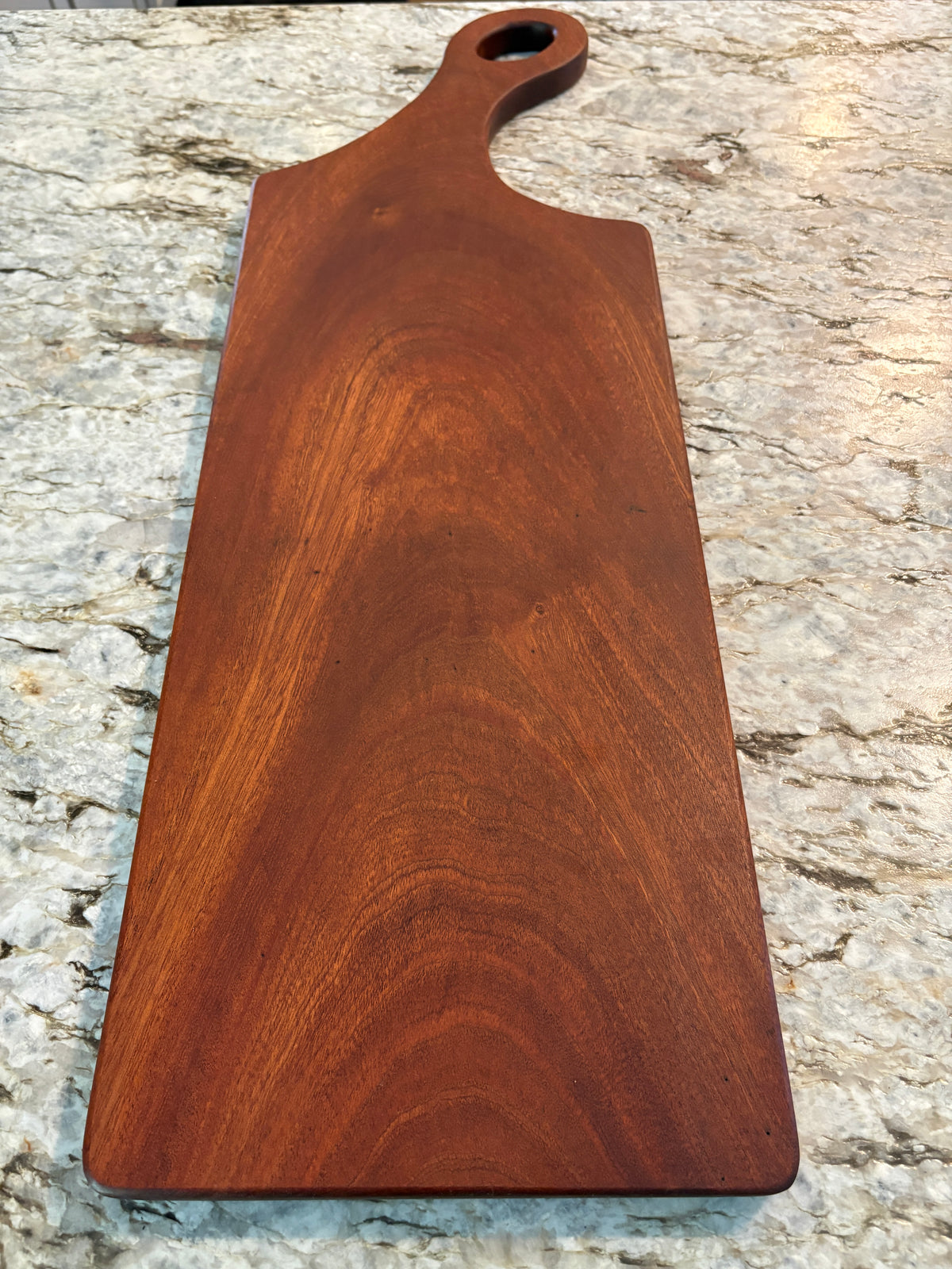 Classic Sapele charcuterie board with oval handle
