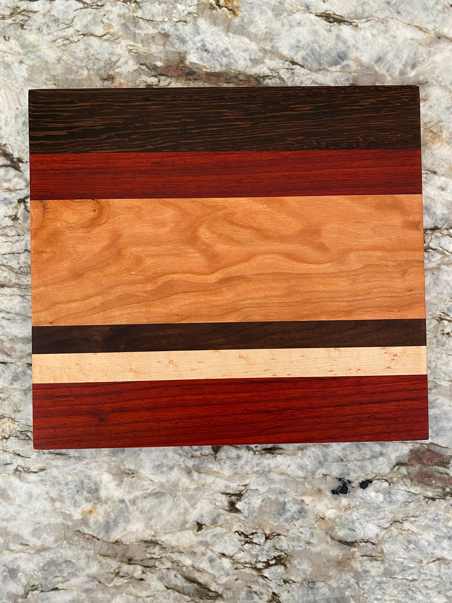 Padauk, Wenge, Birdseye Maple, Walnut, and Cherry cutting board