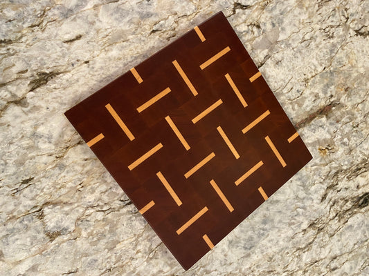 Sapelle end grain cutting board with Maple basketweave