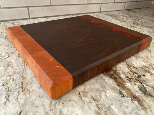 Walnut end grain cutting board/chopping block with Cherry and Padauk highlights