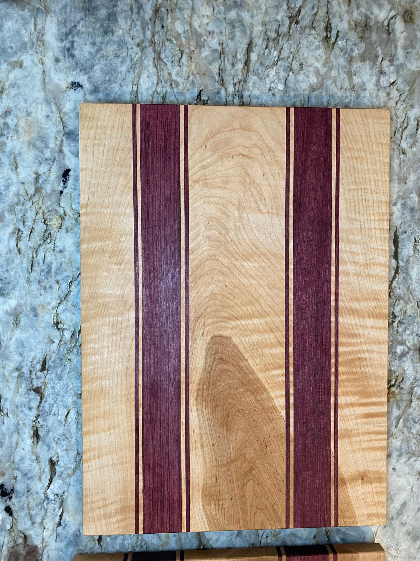 Curly Maple with Purple Heart stripes cutting board