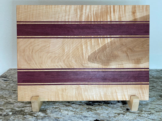 Curly Maple with Purple Heart stripes cutting board